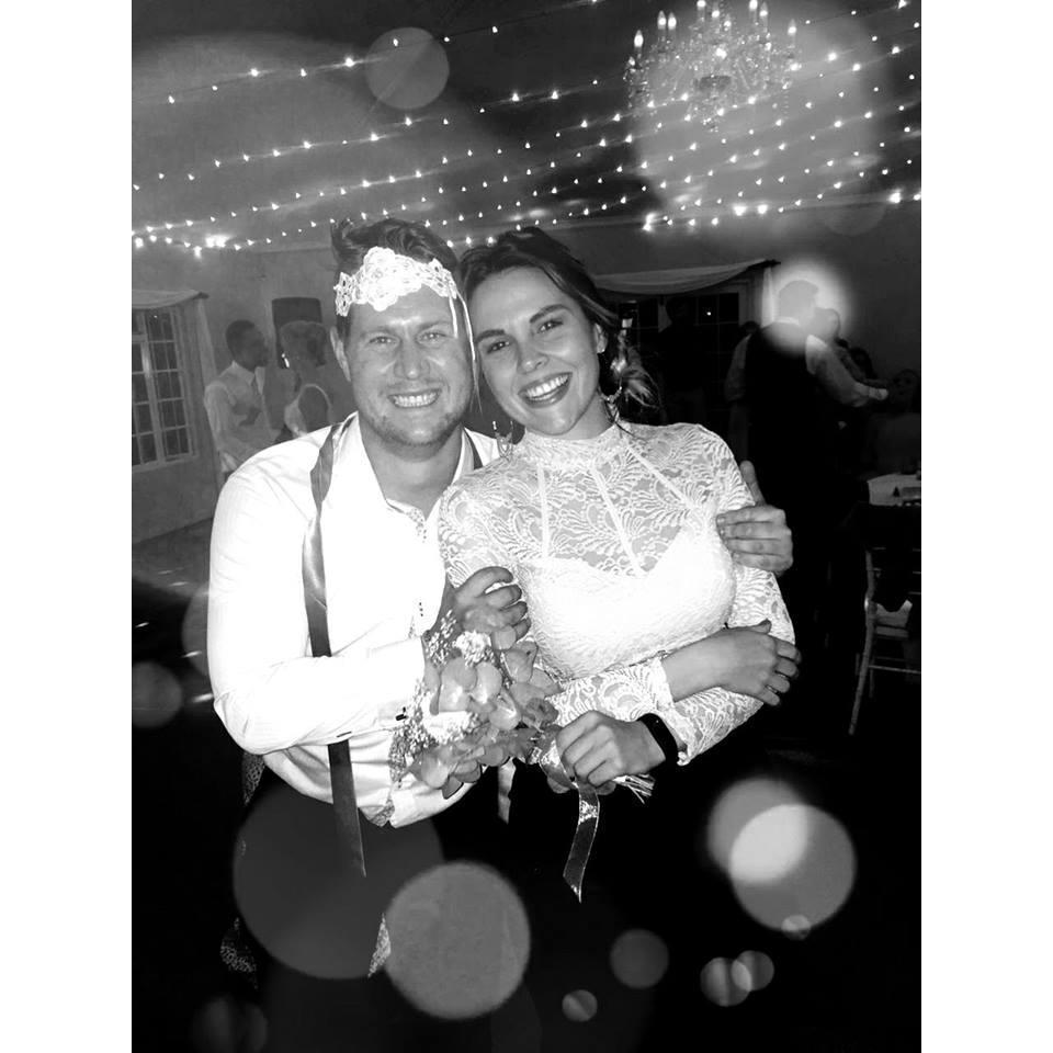 We caught the garter and bouquet at a friend's wedding one week before we got engaged. How's that for luck?