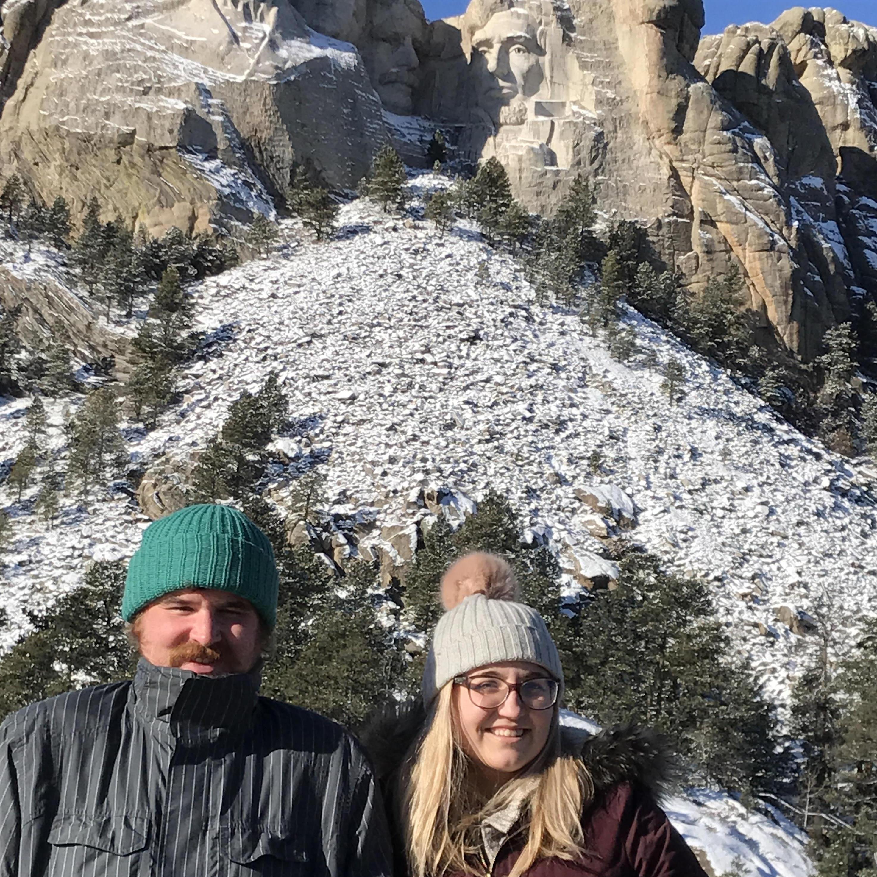 Jake never really visited Shelby in Seattle... because he planned his trip to help her drive back from Seattle-->Memphis. This is a pit stop at Mt. Rushmore on Christmas Eve.
