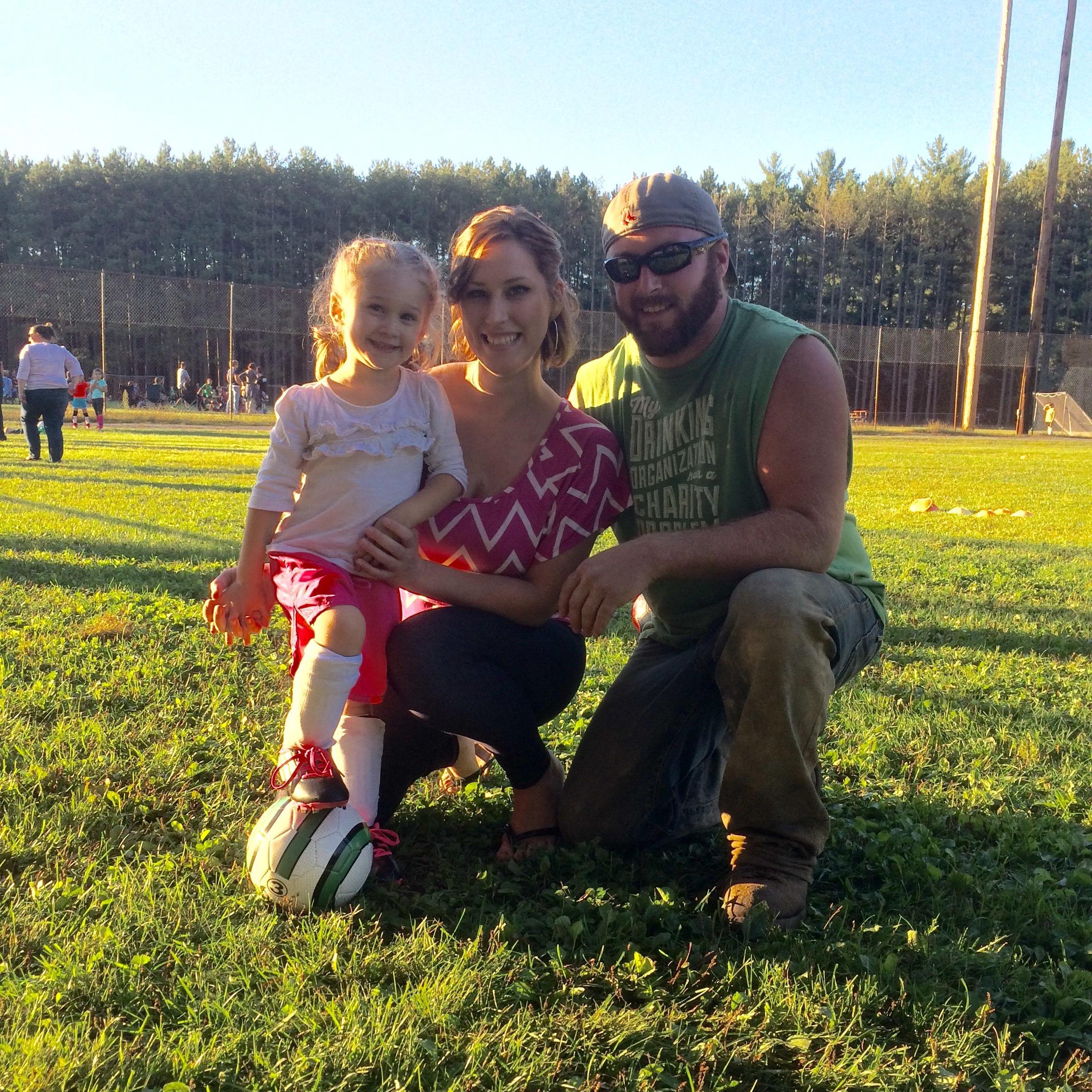 Family photo at soccer practice