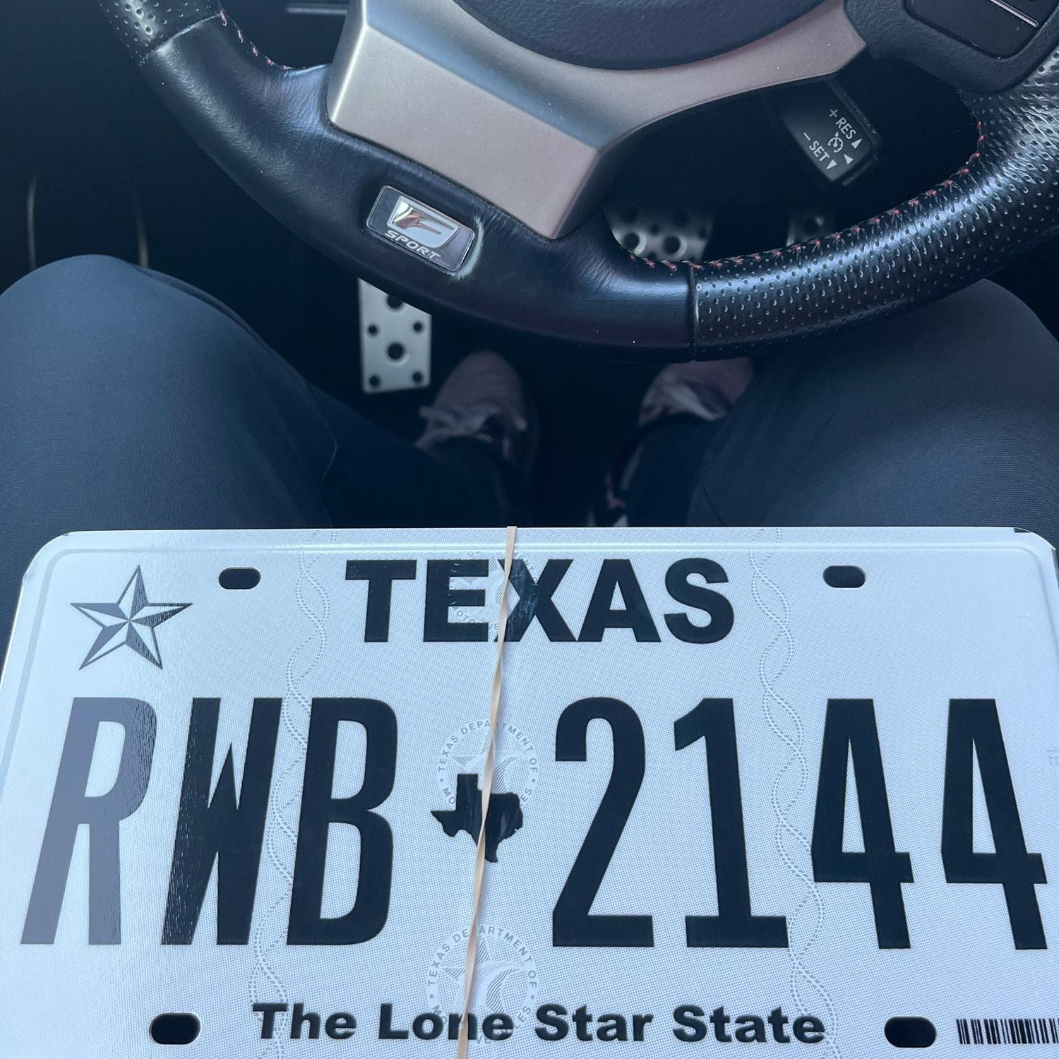 The origins of RWB - Brent moved to Dallas after graduation and got this prophetic license plate. Rachel with Brent + 214 (Dallas area code) + future family of 4? 4 kids? Depends on who you ask!