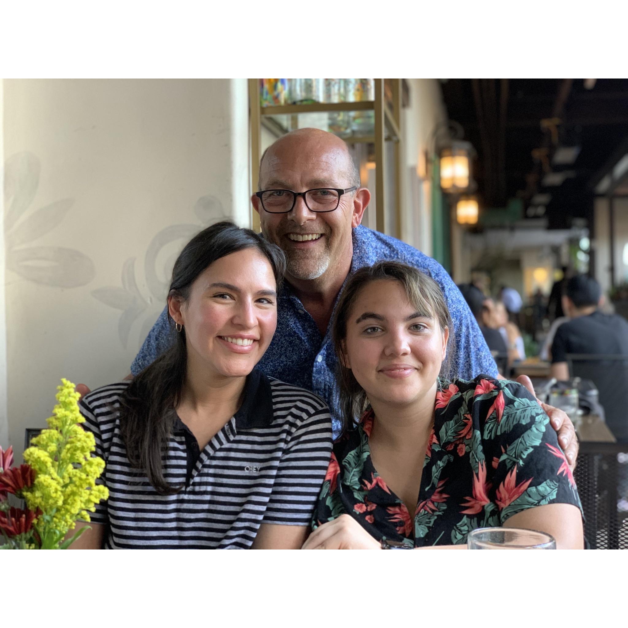 Warren, with his two daughters, Arielle and Gabriella.