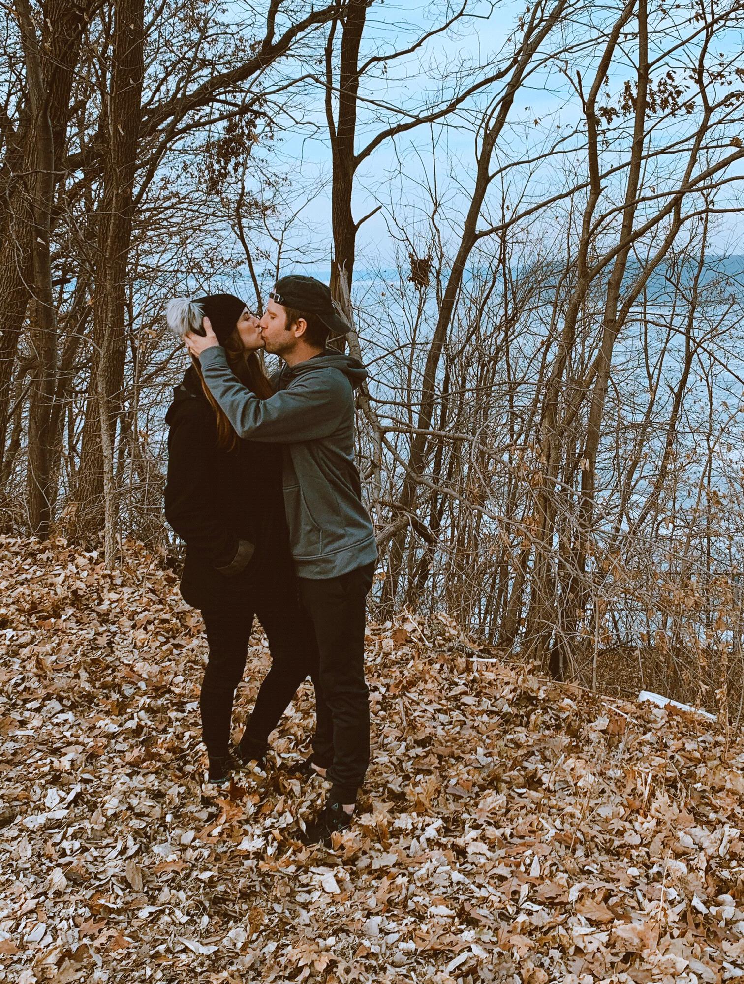 A kiss by the Mississippi River.