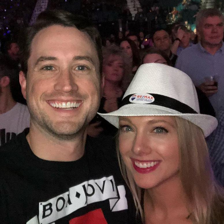 Did you know that we both work together at RE/MAX World Headquarters? Here we are at our annual convention in Las Vegas at the Bon Jovi concert!