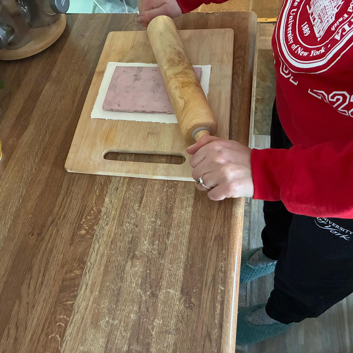 Pressing the stamp to the paper