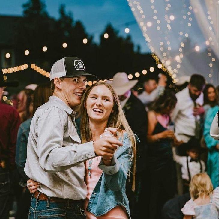 A picture of us at a friends wedding. June 2023