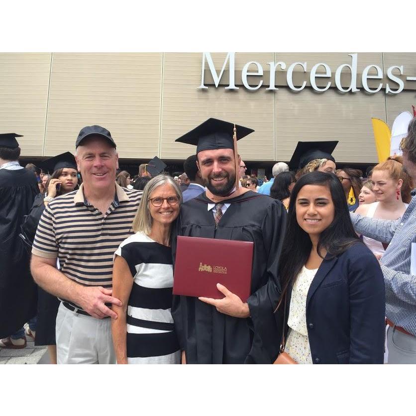 Celebrating Kyle's MBA at the Superdome. Spring, 2019.