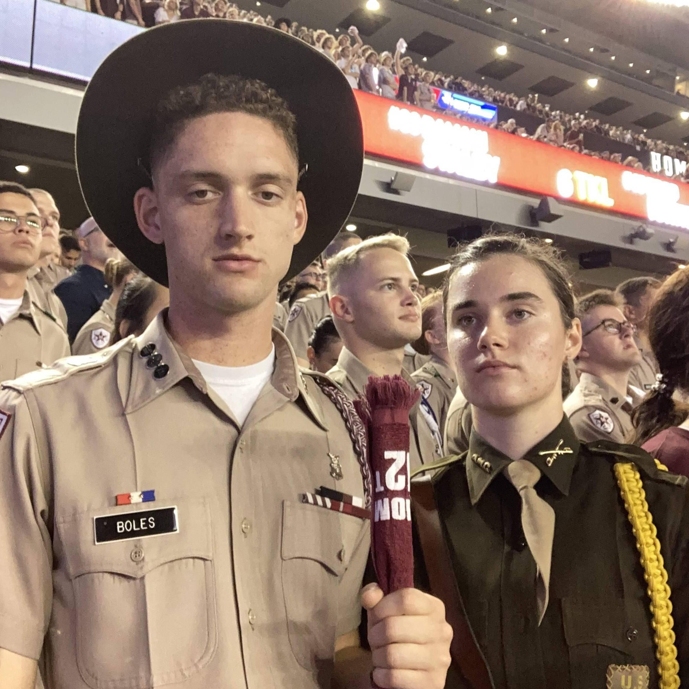 Ah Aggie football...here, Nathan and I recreated American Gothic. I'm in my Cavalry uniform because I had just ridden a horse, and Nathan's in our everyday "Class Bravos" uniform, along with my hat.