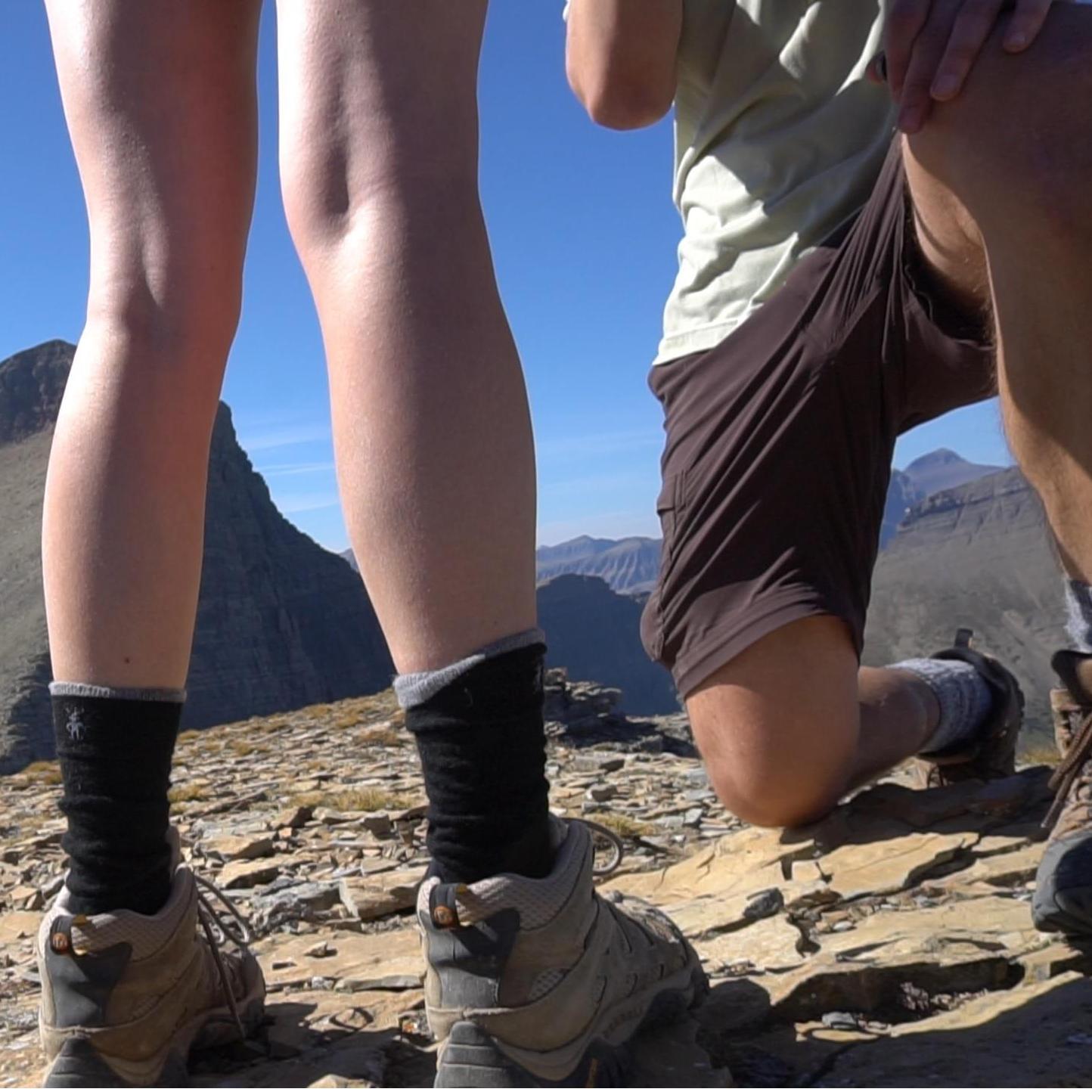David proposing on Triple Divide Peak at Glacier National Park