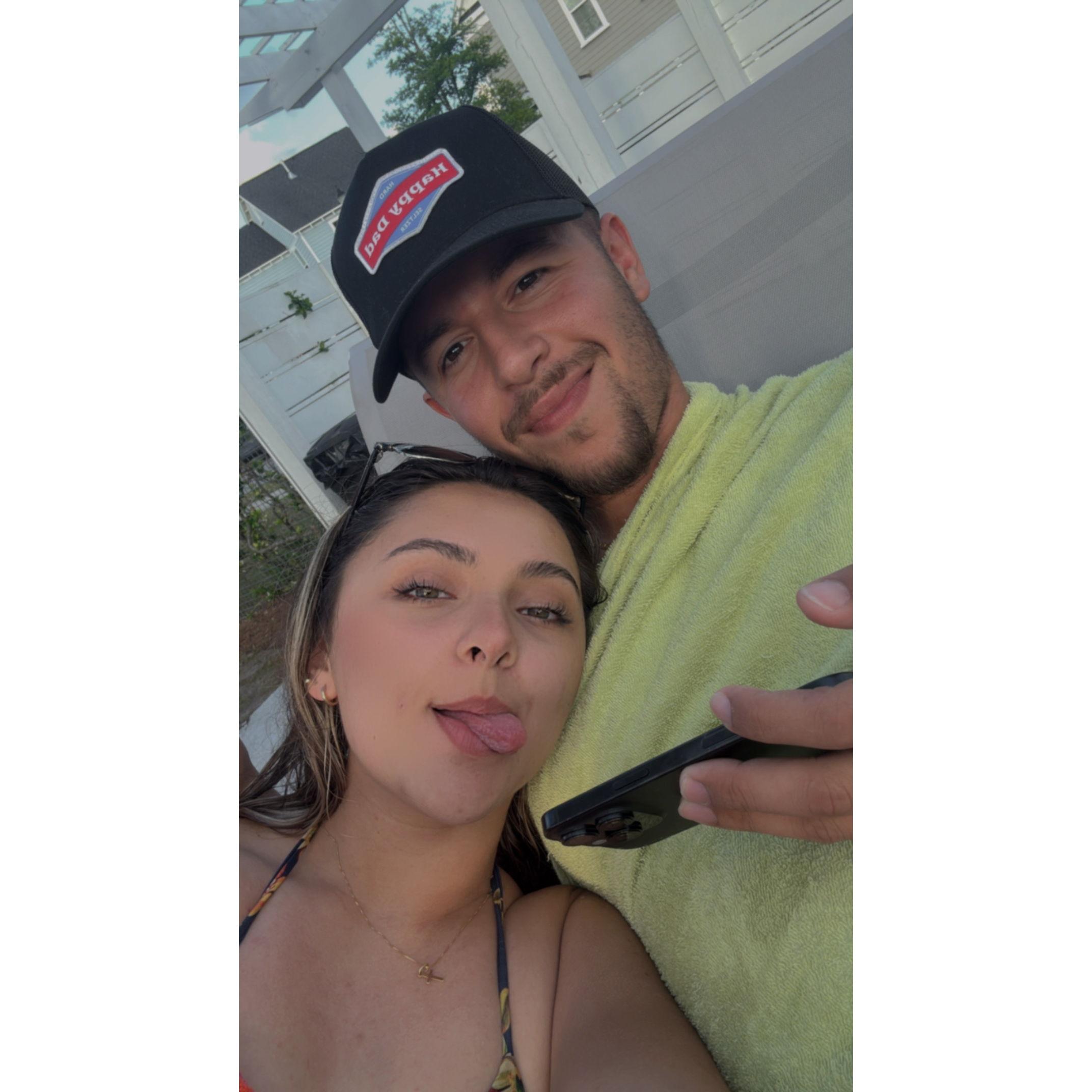 At the pool Gabe watching a Cruzeiro game