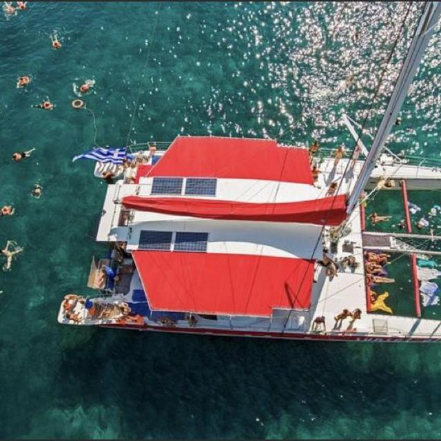 Catamaran day trip and BBQ around the caldera