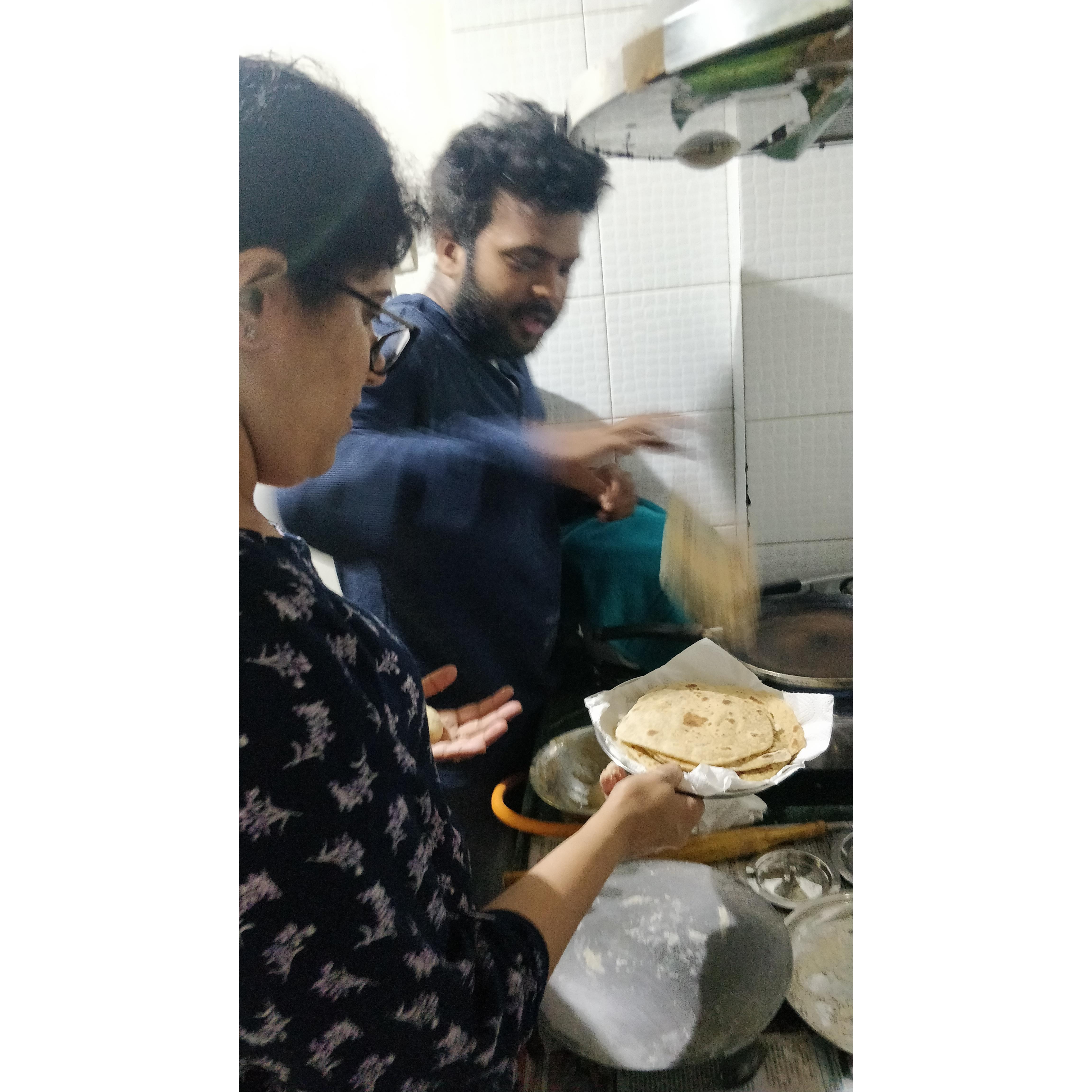 Nidhi giving a paratha-making lesson