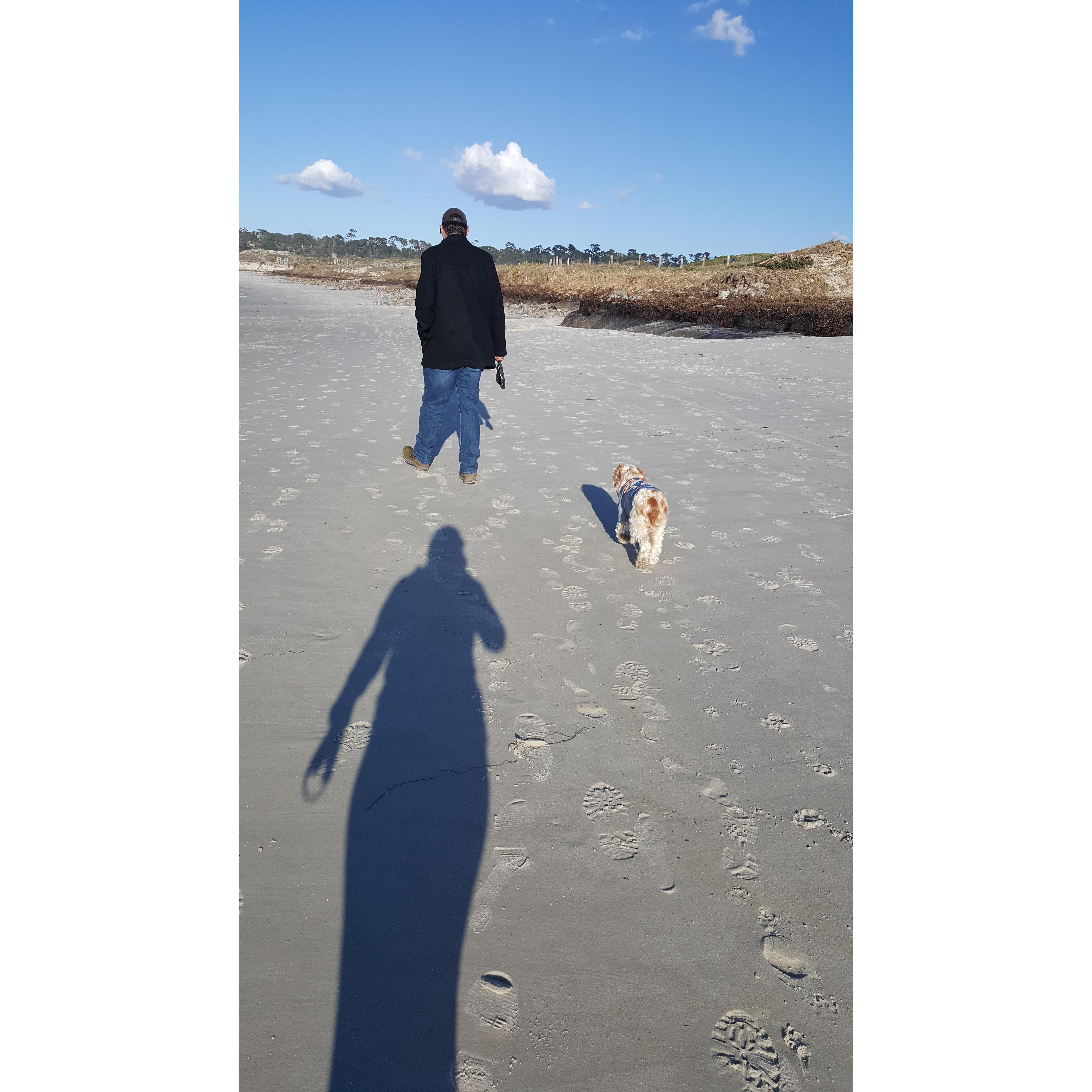 Last beach day with Coco. Her shirt says Snack Attack!