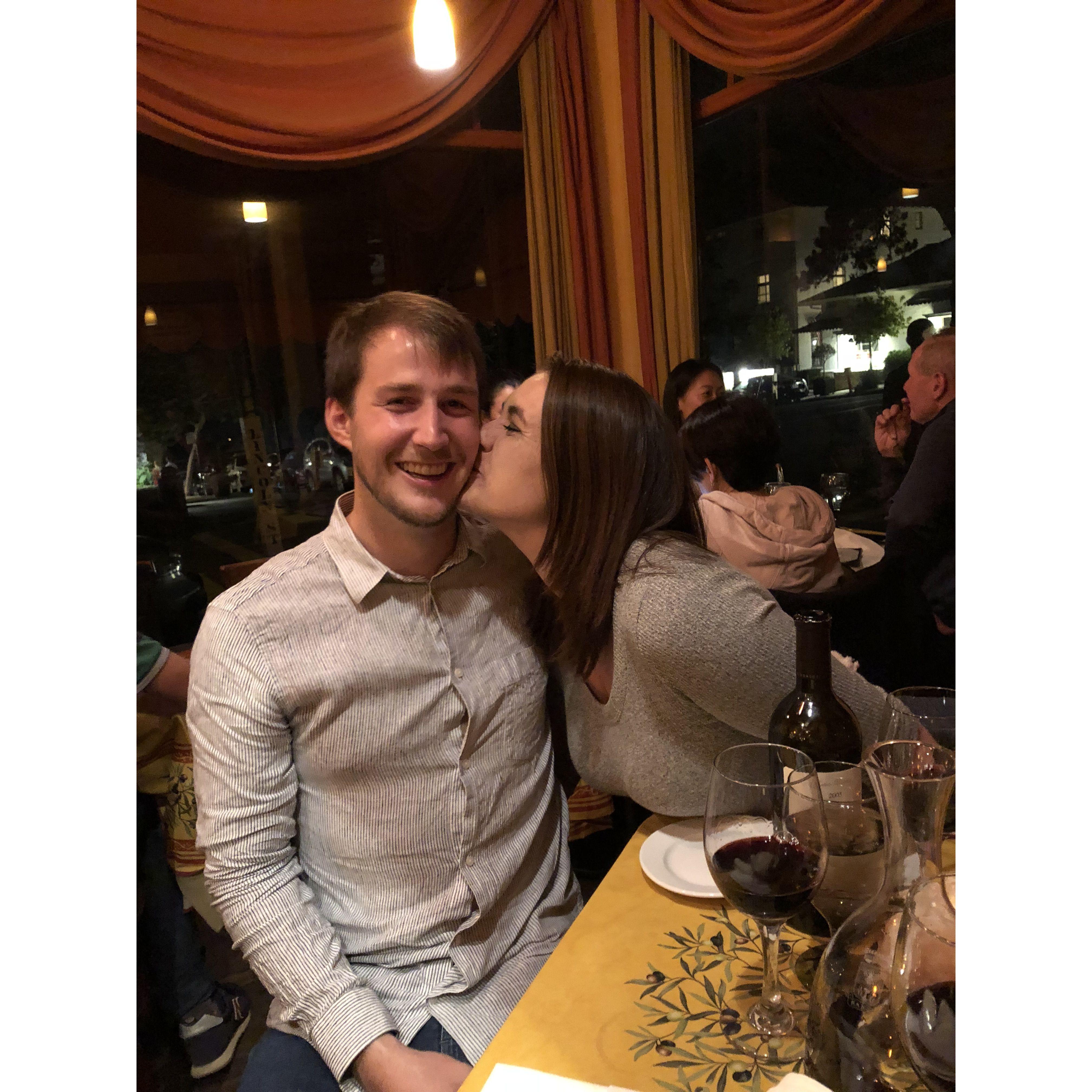 Stealing kisses from Flo at dinner in Carmel!