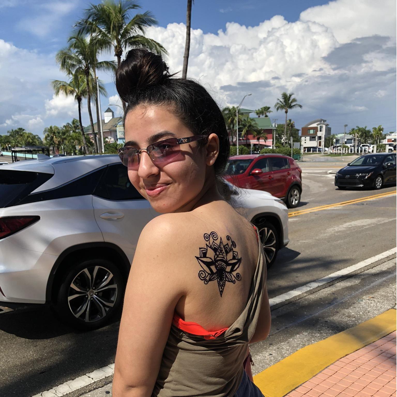 Getting henna tattoos are her favorite!