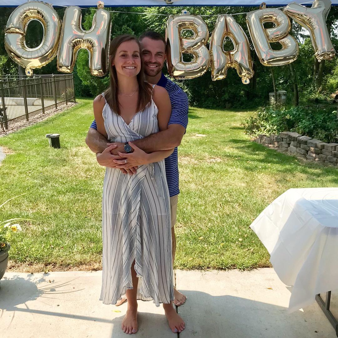 The secret's out - we announced that we're having a baby! This photo is from our Baby Shower and Elle's Going Away Party in Wisconsin.