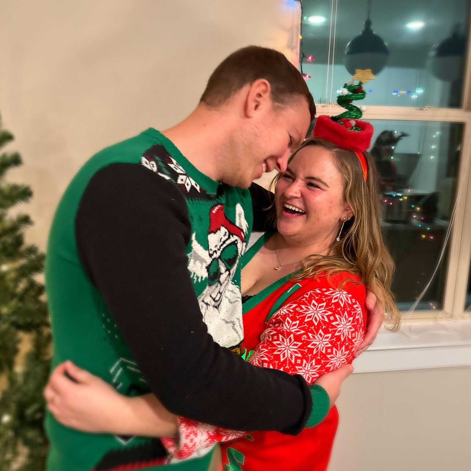 Dec. 9, 2023 - Getting festive with our ugly sweaters, about to celebrate our first Christmas together!