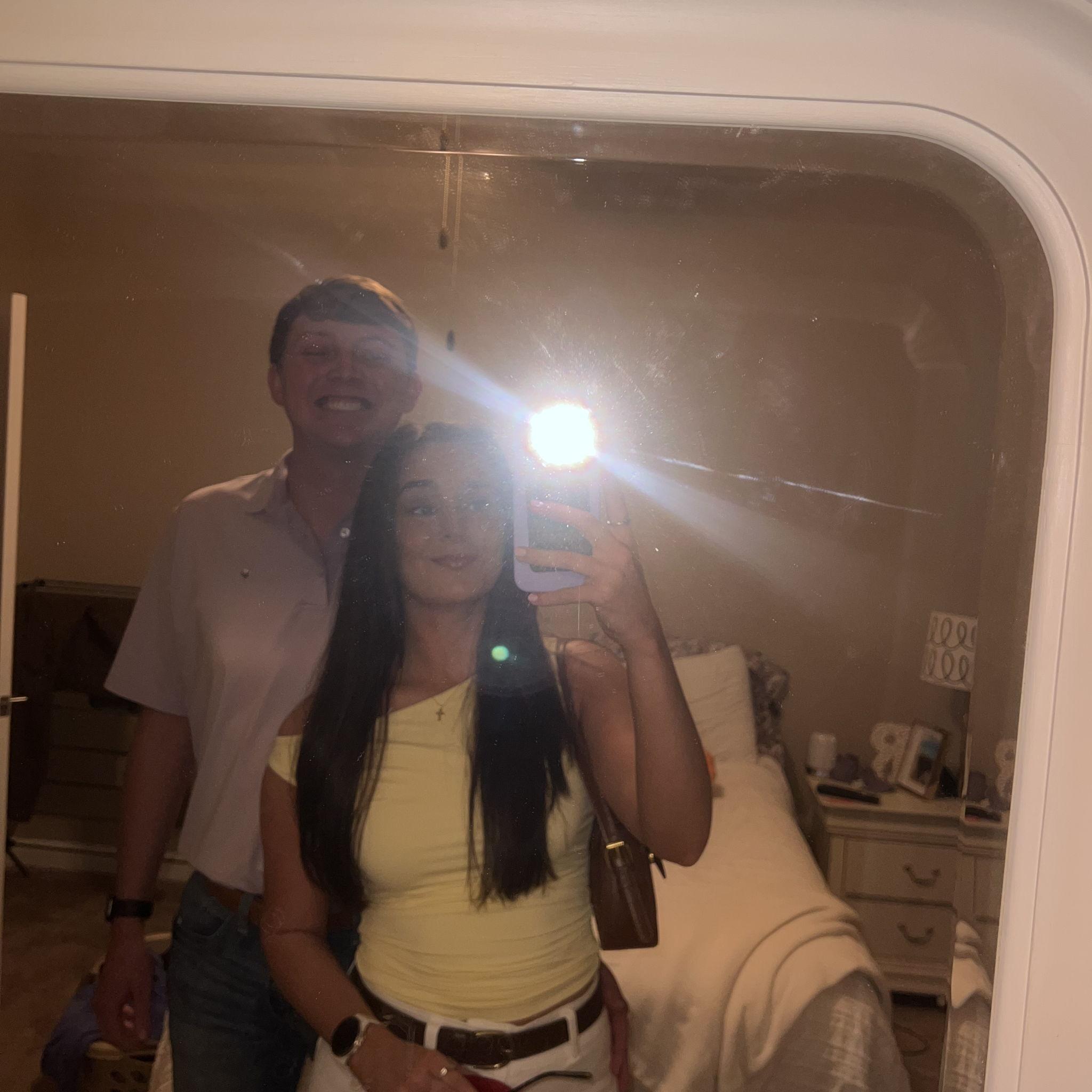 A quick mirror selfie I snapped before we got engaged! I was clueless and was in no rush at all!