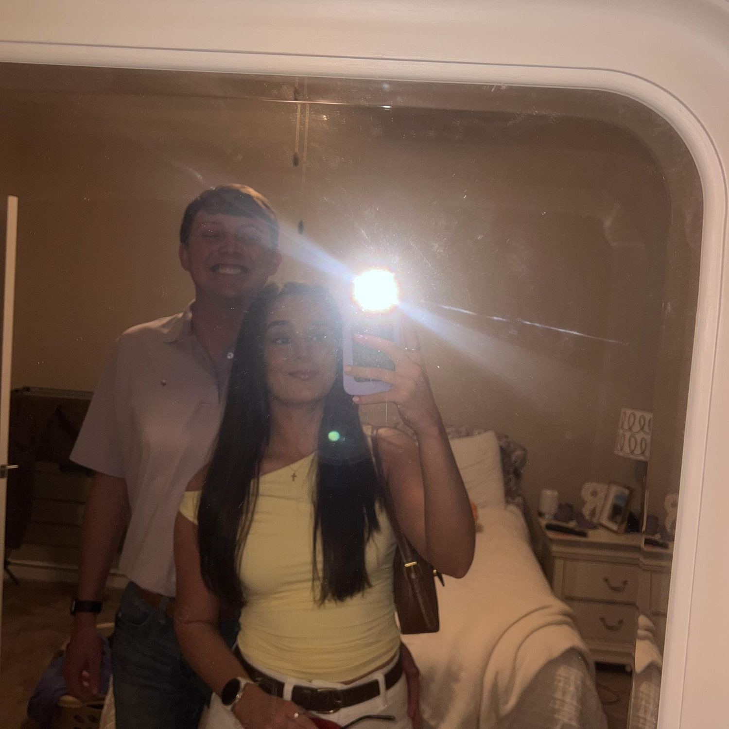 A quick mirror selfie I snapped before we got engaged! I was clueless and was in no rush at all!