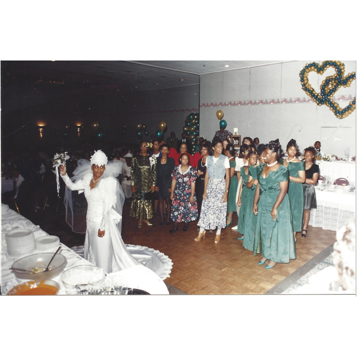 LaVonya tossing the bouquet to the single ladies - My G'Ma Vivian is representing the seasoned single ladies-LOL
