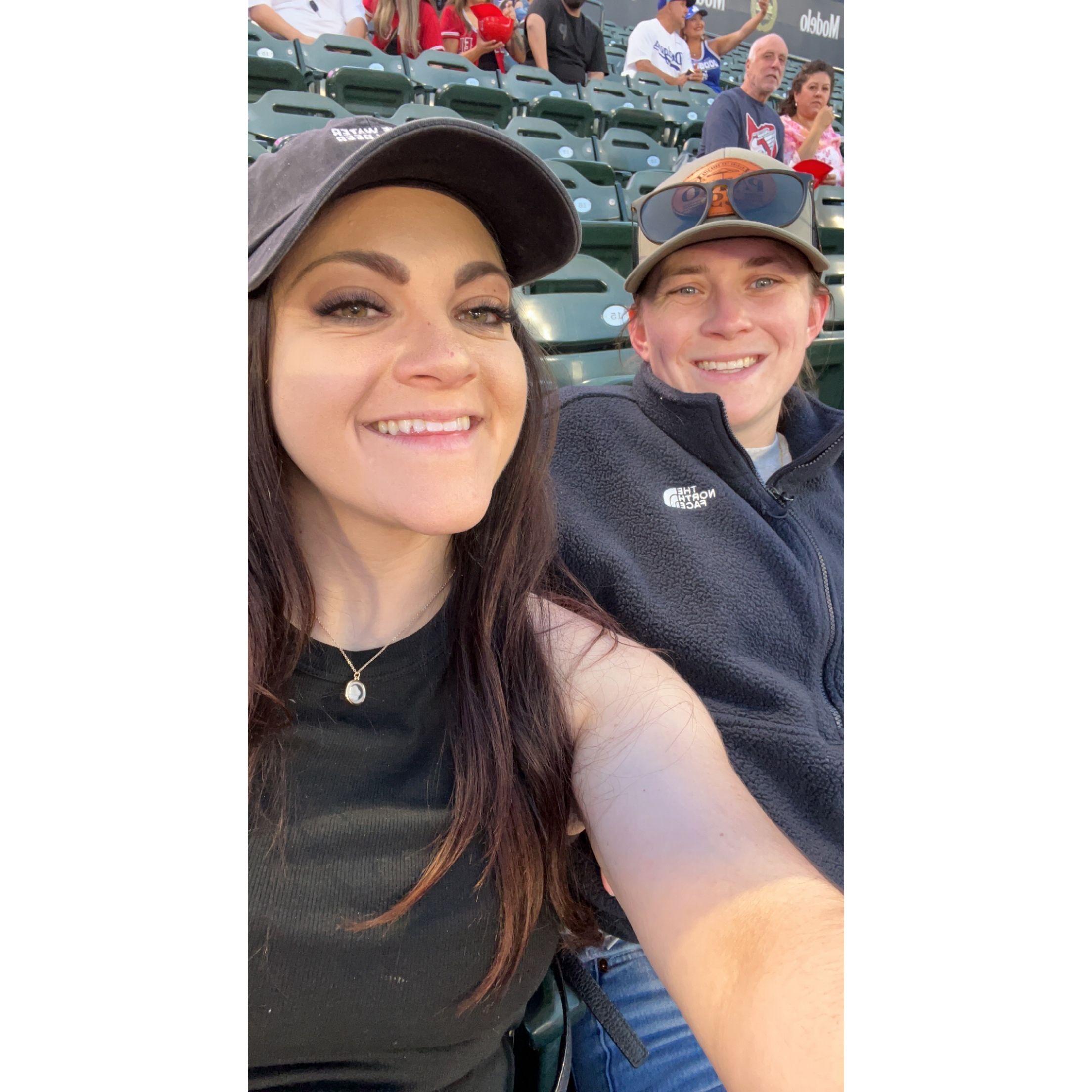 Carissa and Becca at baseball game.