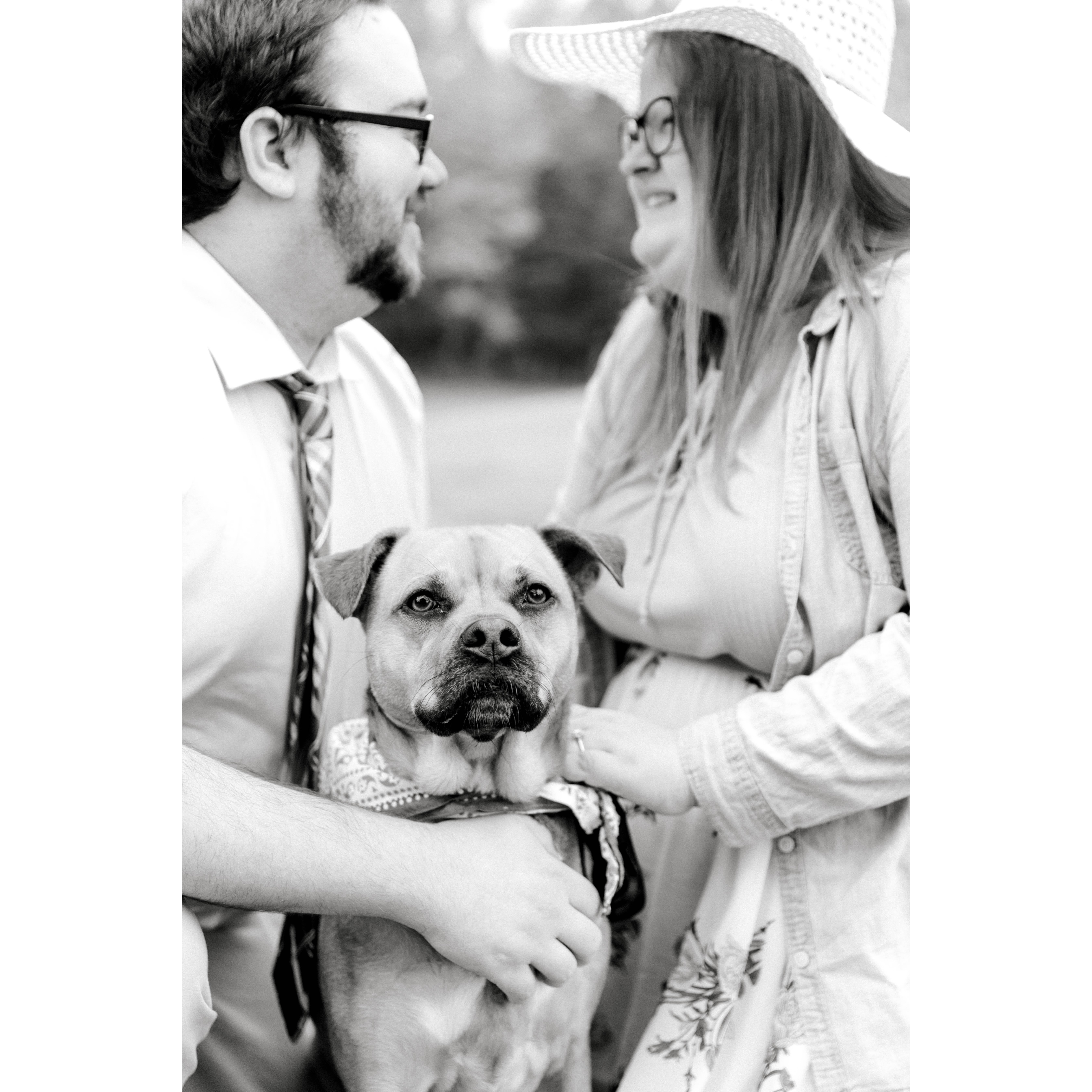 Our favorite picture from our engagment session, featuring our pride and joy, Gracie!