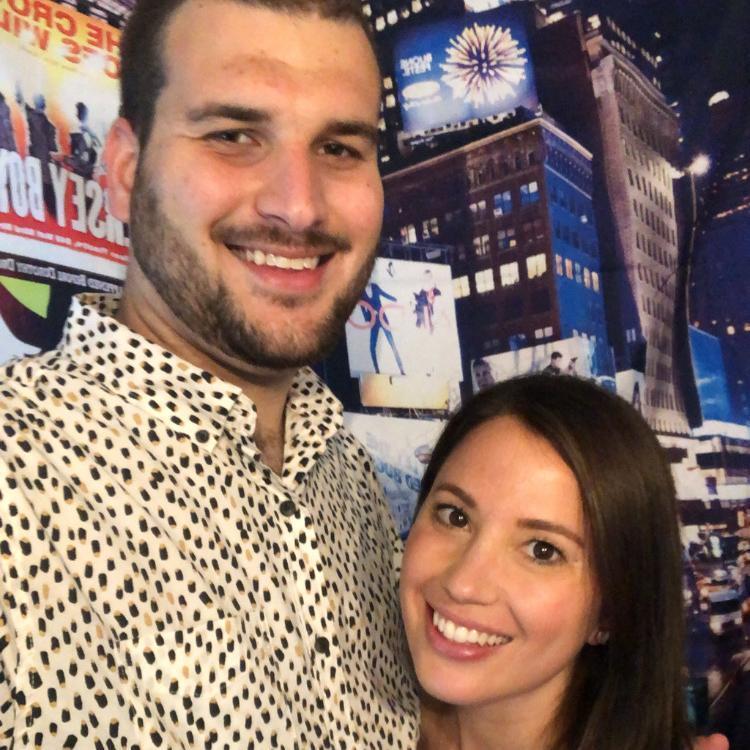 The night we got engaged - in front of the NYC backdrop