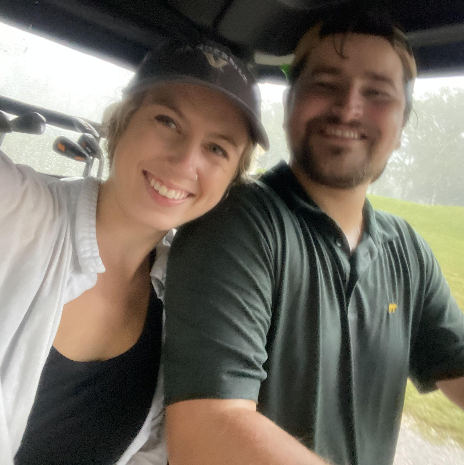 Golfing in the pouring rain.. who's idea do you think this was??