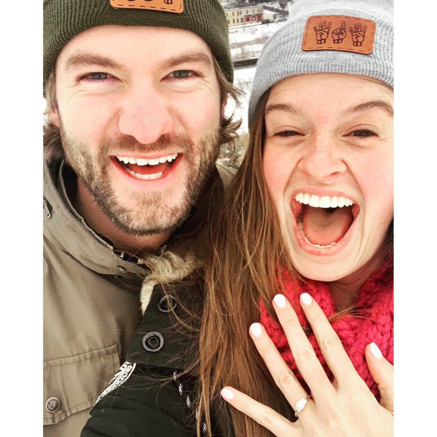 Mike popped the question on a snowy New Years Eve morning on a walk past our soon-to-be home on Kadish Hill. 

Not pictured: Dad sledding with his kid clapping in the background