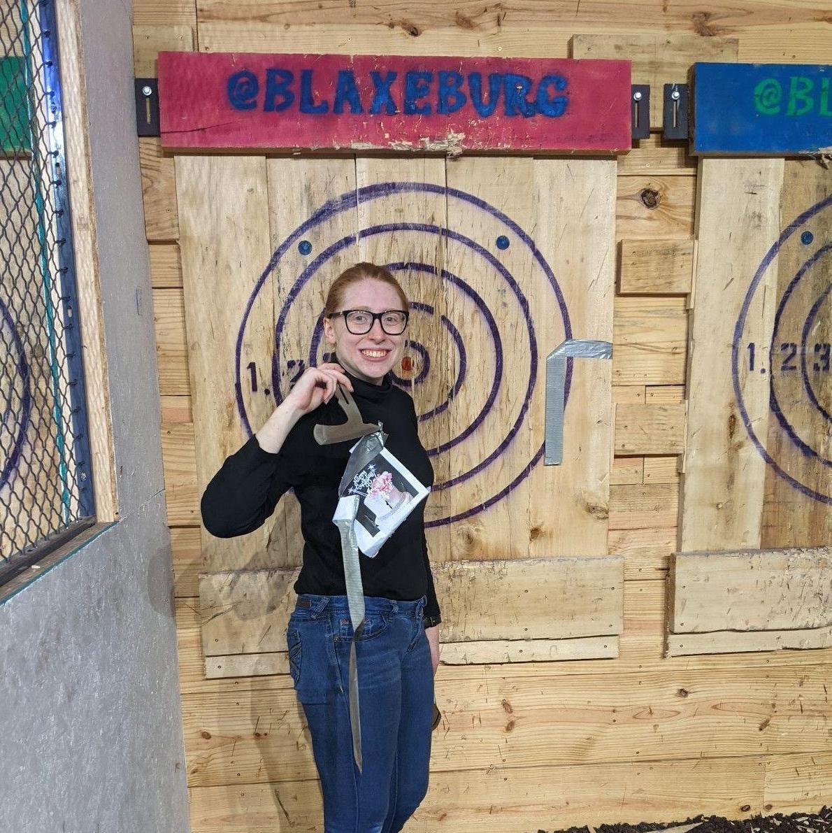 Kat destroyed her paper cake at axe throwing for her 24th birthday!
