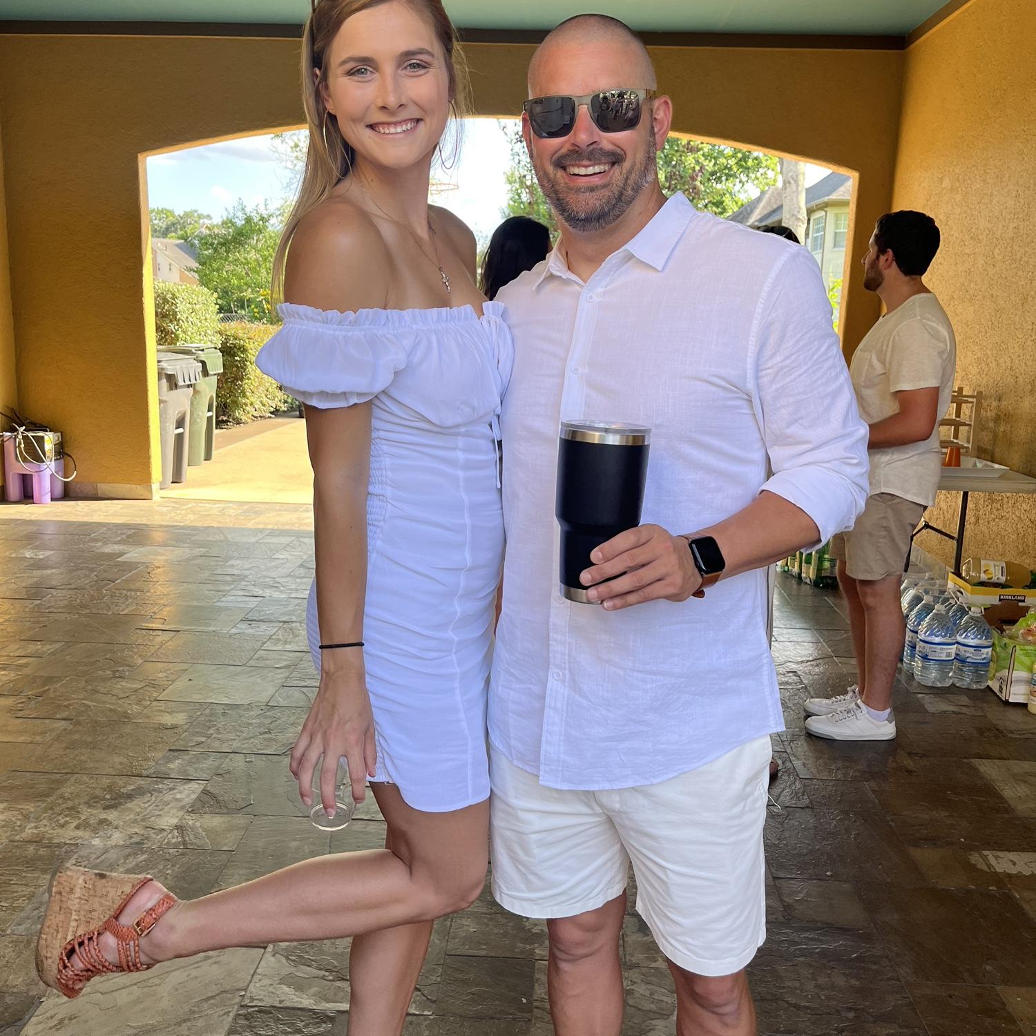 One year together! Spent at a linen party with friends, drinks, and a trip in the pool
