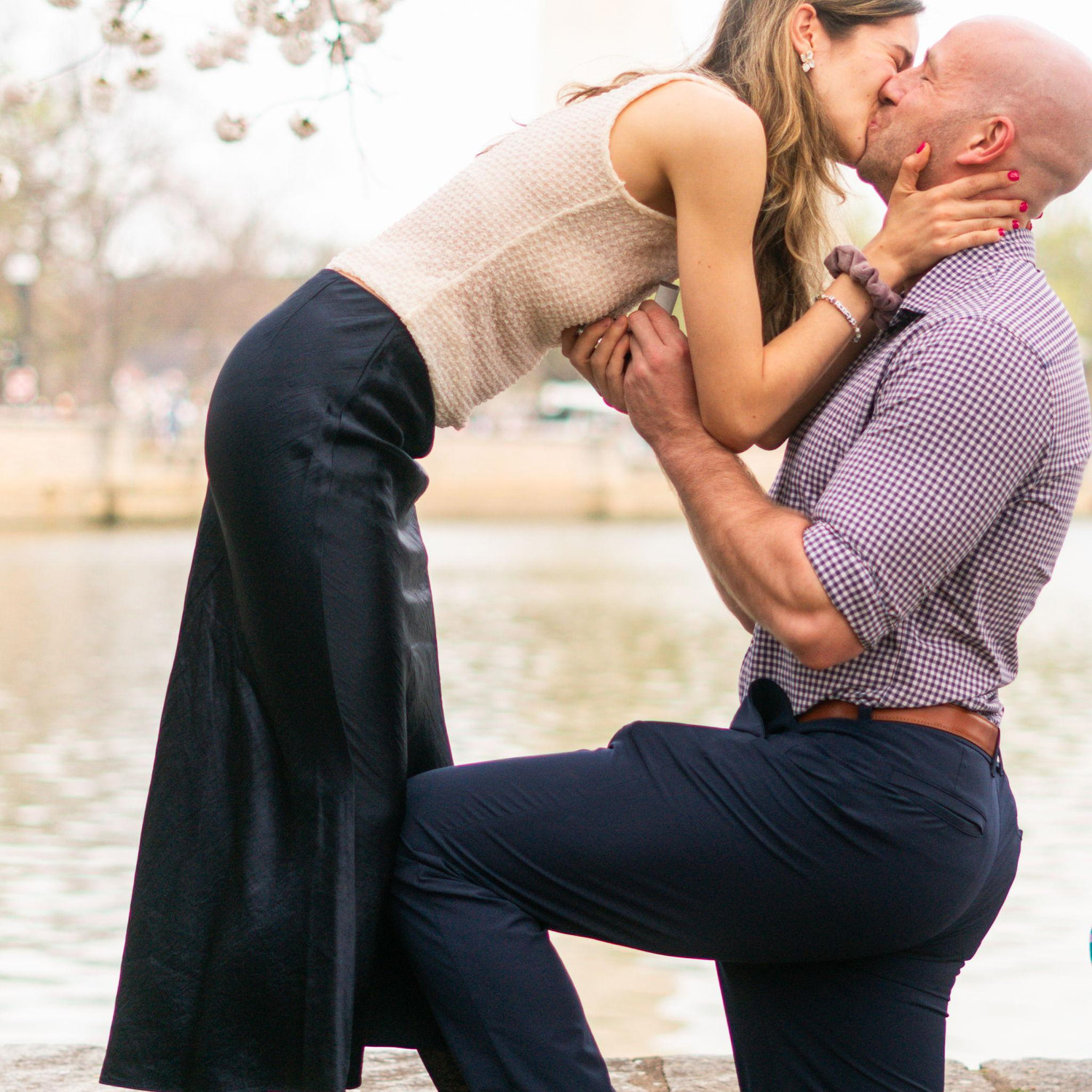Surprise proposal under the cherry blossoms