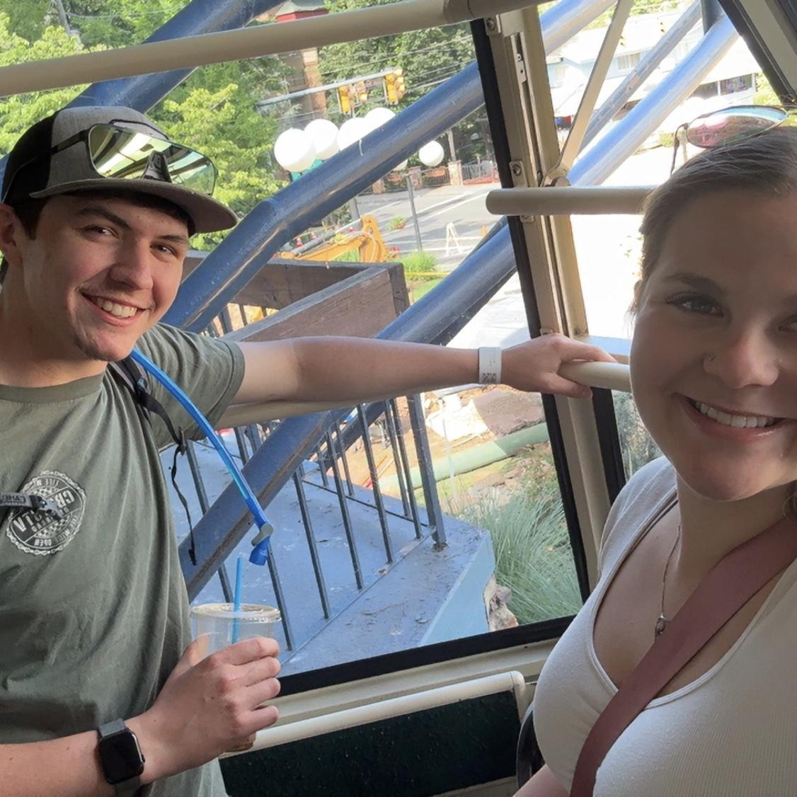 Taking a gondola for him to go down hill mountain biking