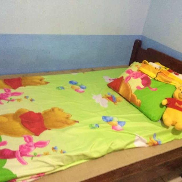 Mr. Perfect supporting my Winnie the Pooh craze. This is his bed when he worked in Coca Cola Solano 😂