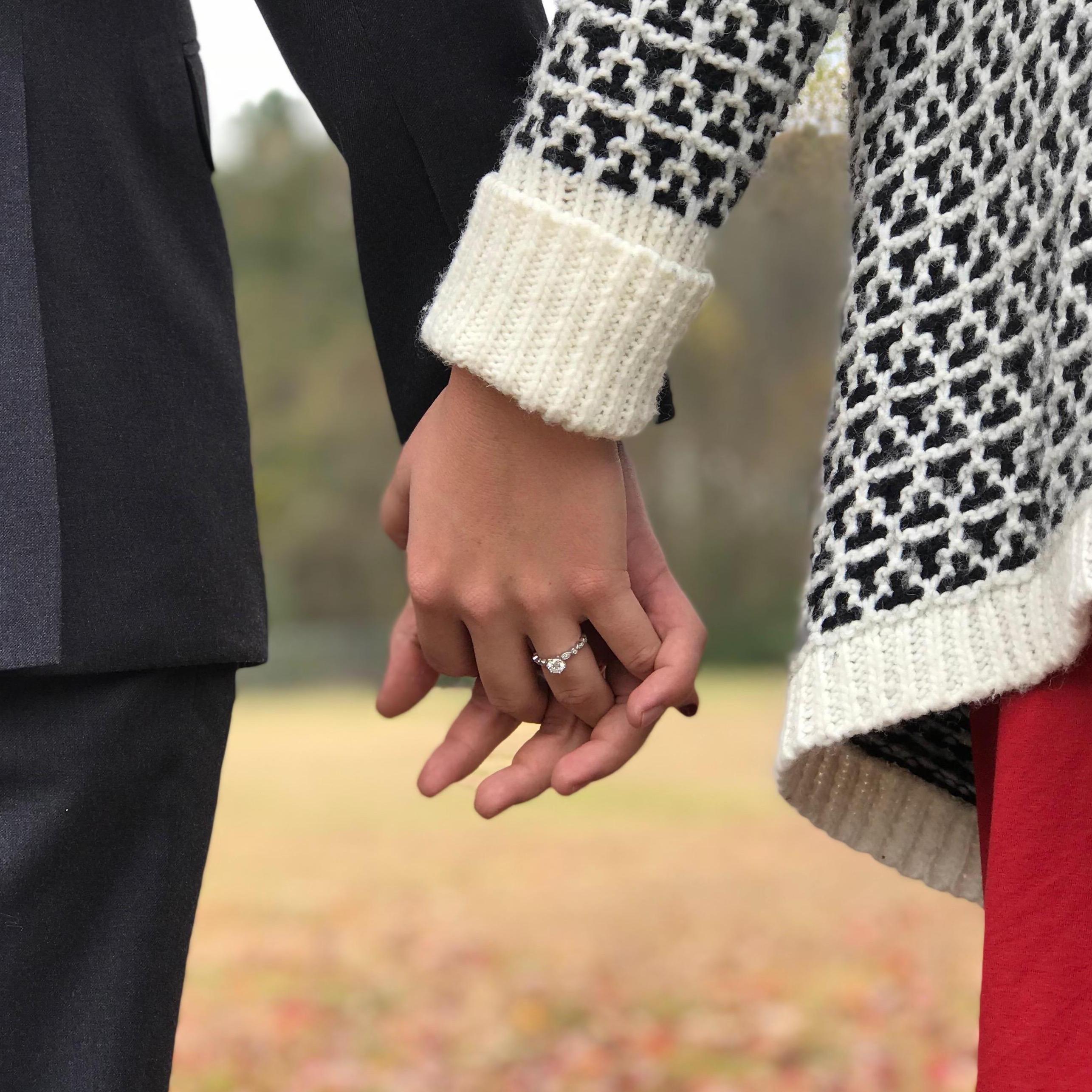 This picture was taken on November 25, 2018, four days after Evan proposed. This is their first engagement picture.