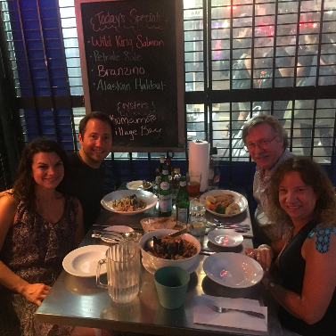 Sharing San Francisco's best cioppino at Sotto Mare with Emily's mom Julie and stepdad Benjamin