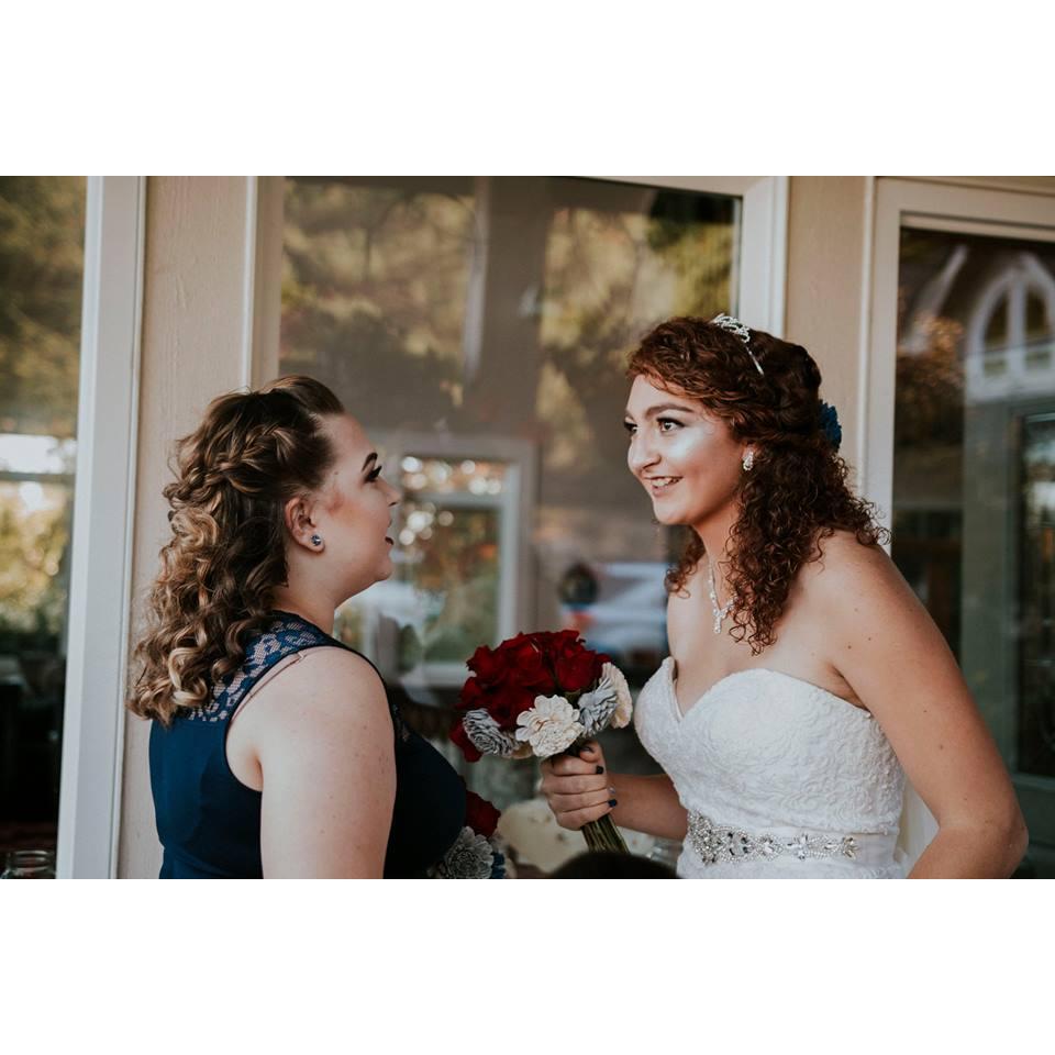 Last moment pep talk before walking down the isle 
Photo credit to: A Heart That Beats For One Photography