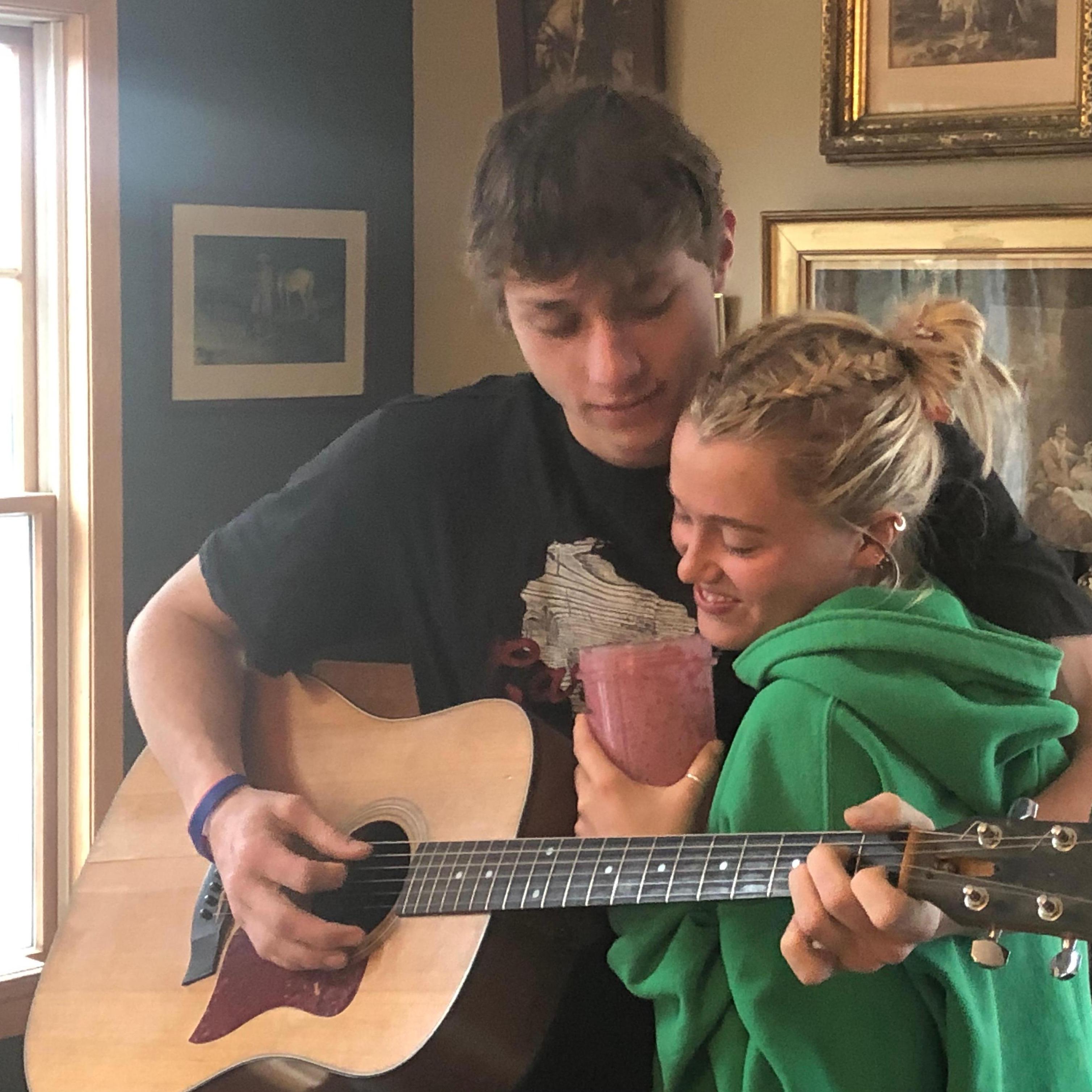 Smoothies and guitars are a staple in our lives. Henry's dad captured this moment from a time visiting them. We were around 18 (Cayla) and 20 (Henry)!