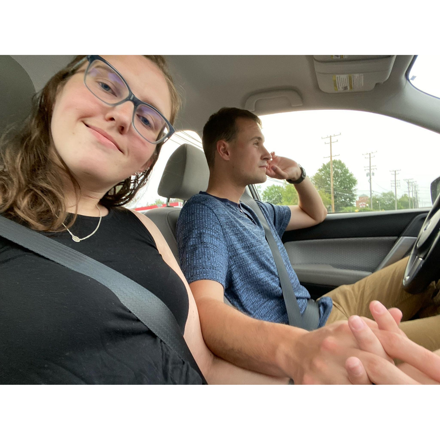 At a red light (I always drive with 2 hands on the wheel)