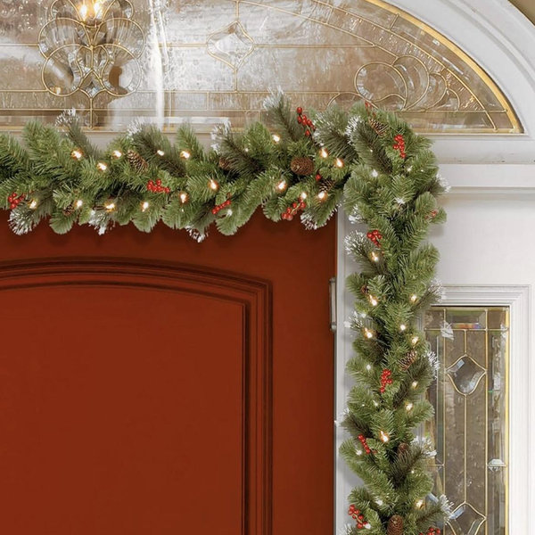 National Tree Company 9 ft Pre-Lit Crestwood Spruce Artificial Christmas Garland, Christmas Decoration with Glitter, Pinecones, Red Berries, 50 Clear Lights, 180 Tips, Green