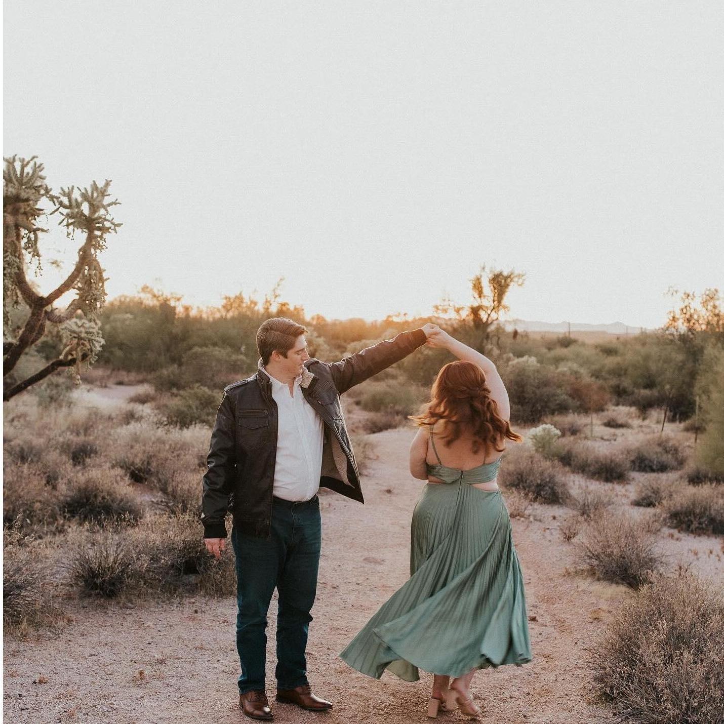 Dancing in the desert during our engagement shoot