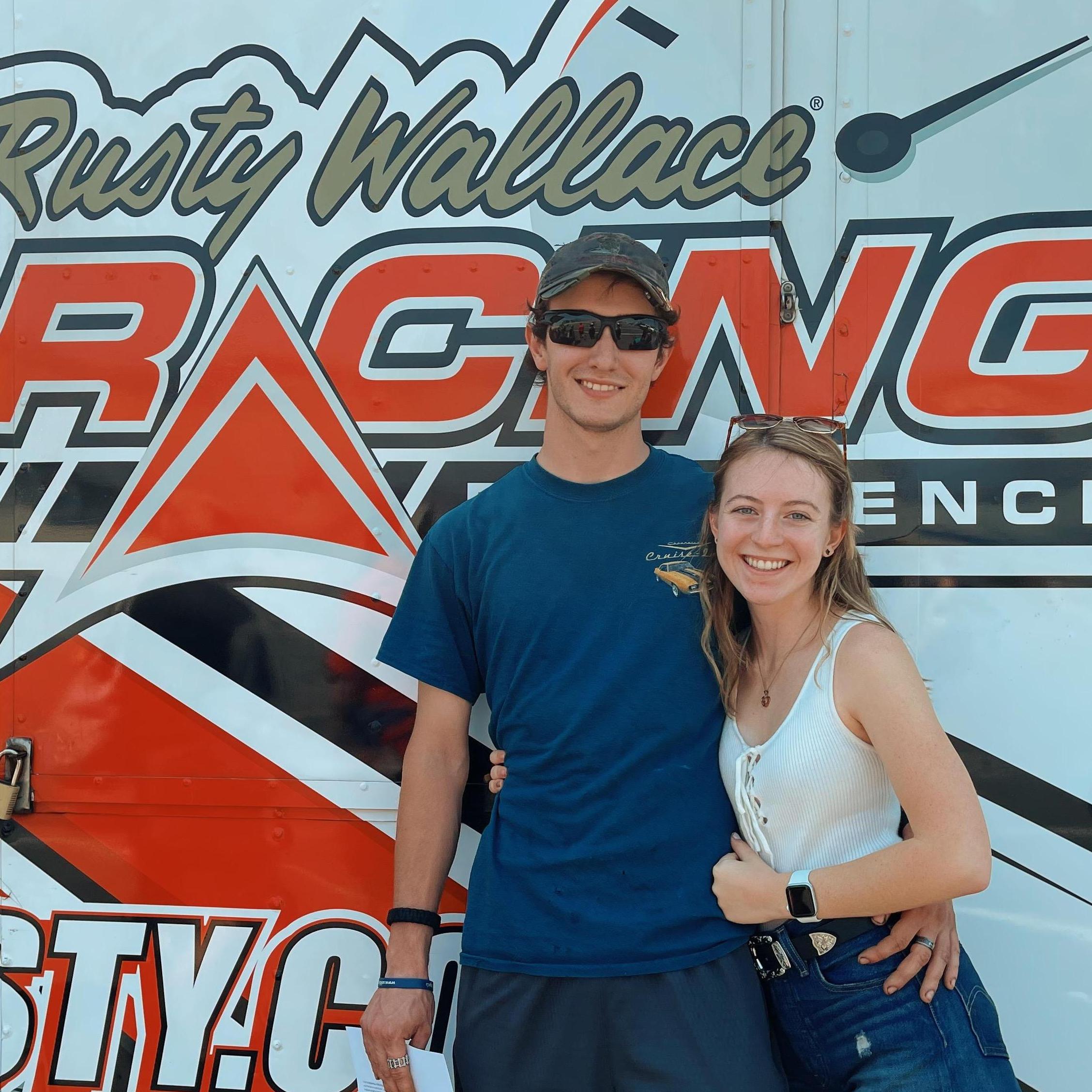 As if my nerves weren't already up because Nick was going to be driving a racecar on the track this day, but he ended the experience riding off in an ambulance too.. June heat is no joke folks!