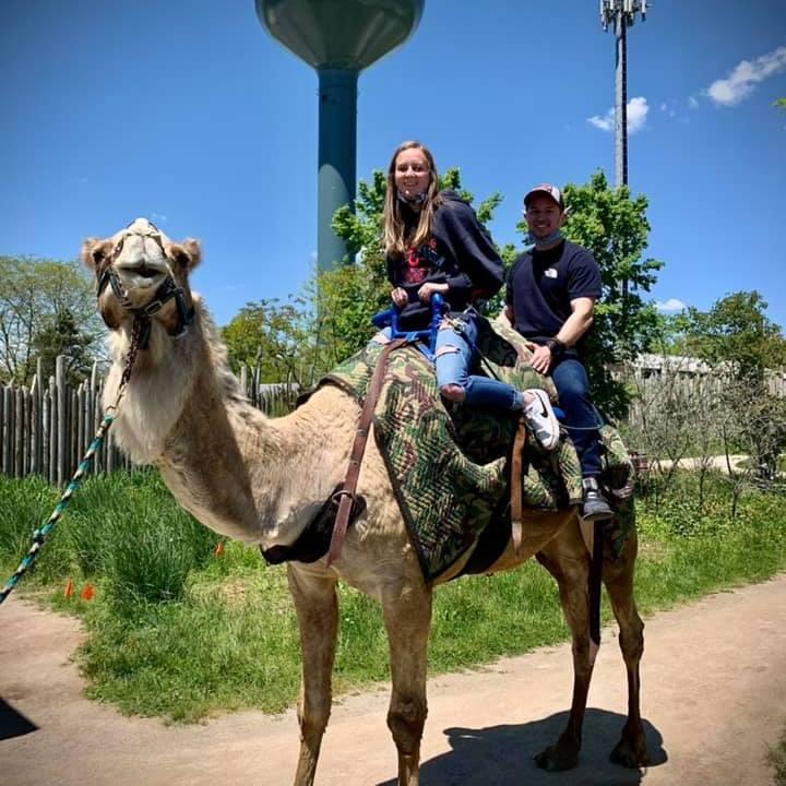 Smile! We road a camel!