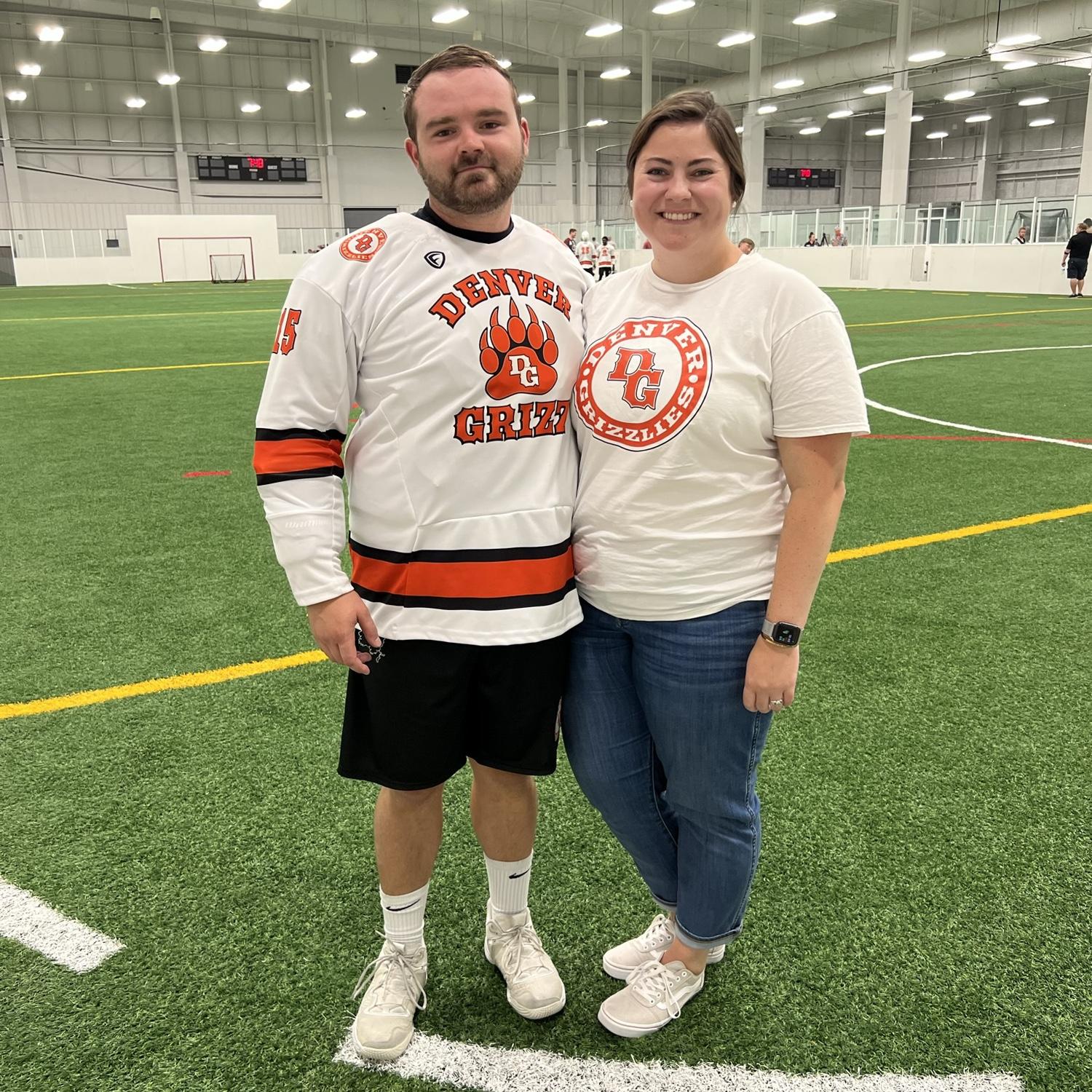 Box lacrosse is a big part of their relationship. Zack most likely scored a goal in this game, and Alexis was yelling at the other team.