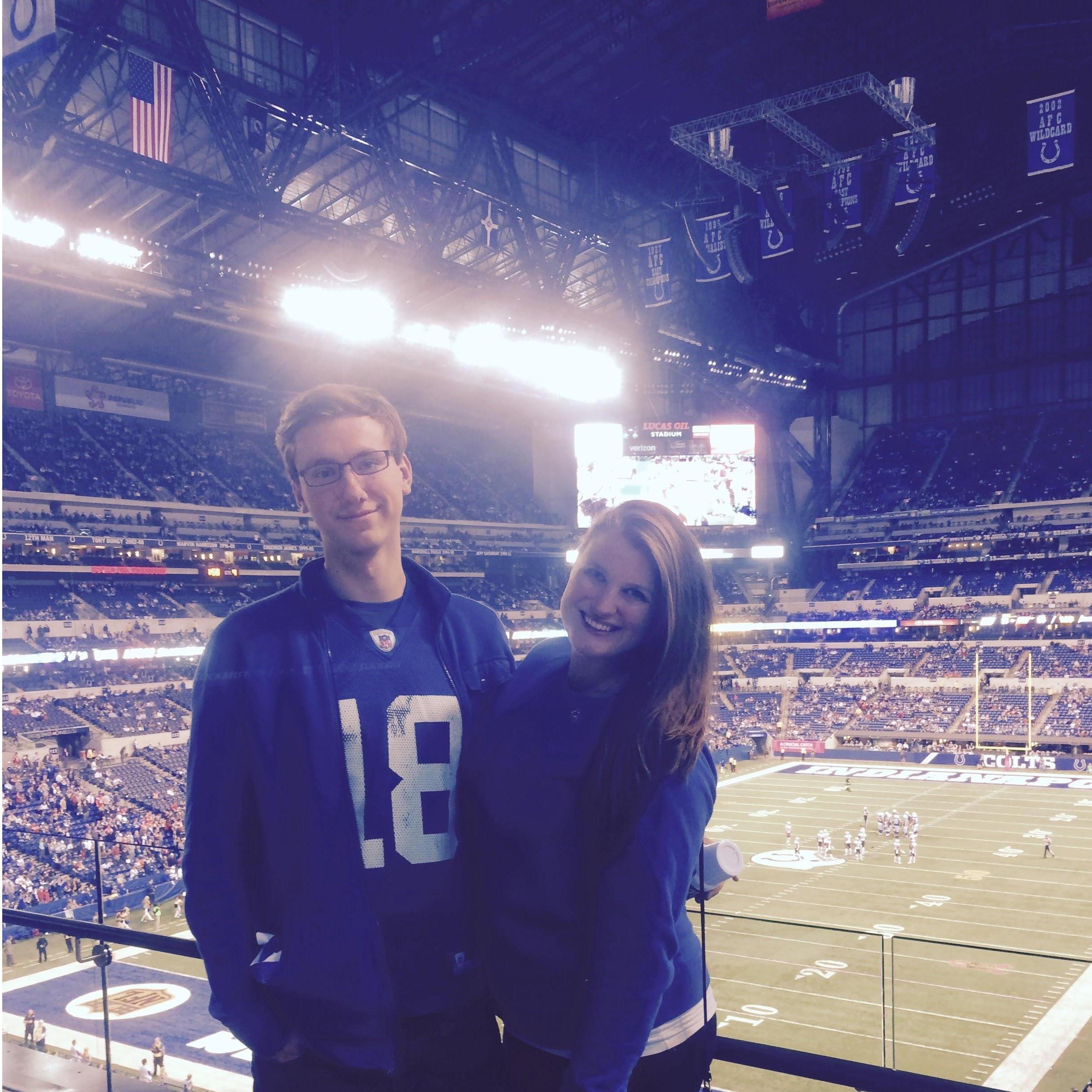 We drove all the way down to Indianapolis to watch the Pats play the Colts... and Denis hid his Peyton Manning jersey the WHOLE time until we took this picture...