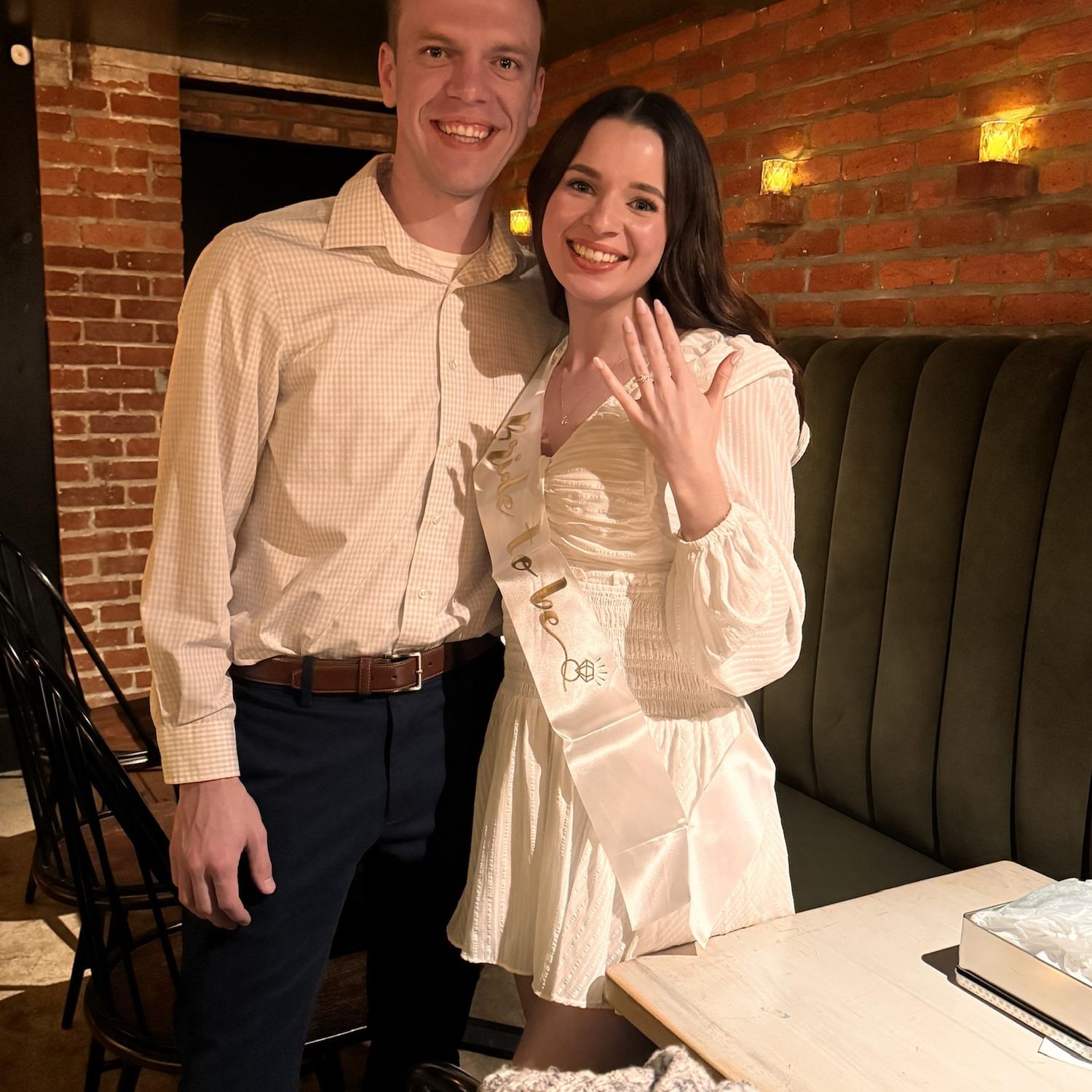 Nathan planned a (surprise) engagement party! It was in the cozy basement of Oakley Wines, across from our apartment.
