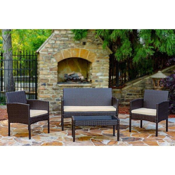Tessio 4 Piece Rattan Seating Group with Cushions