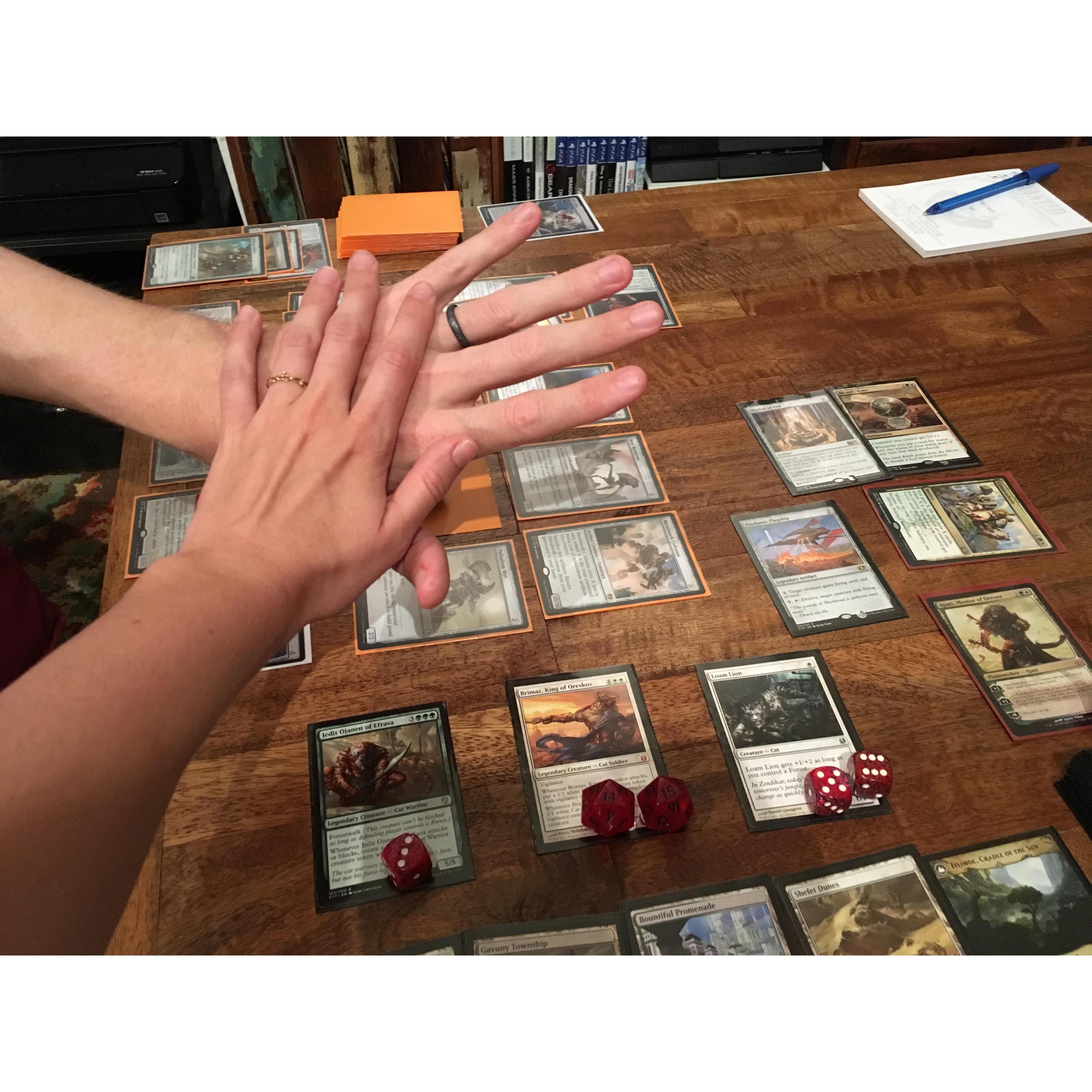 We're engaged! I proposed to Nick by hiding his ring in a deck of MTG cards before our game. Thank goodness he said yes before the game because I beat him pretty badly. : )