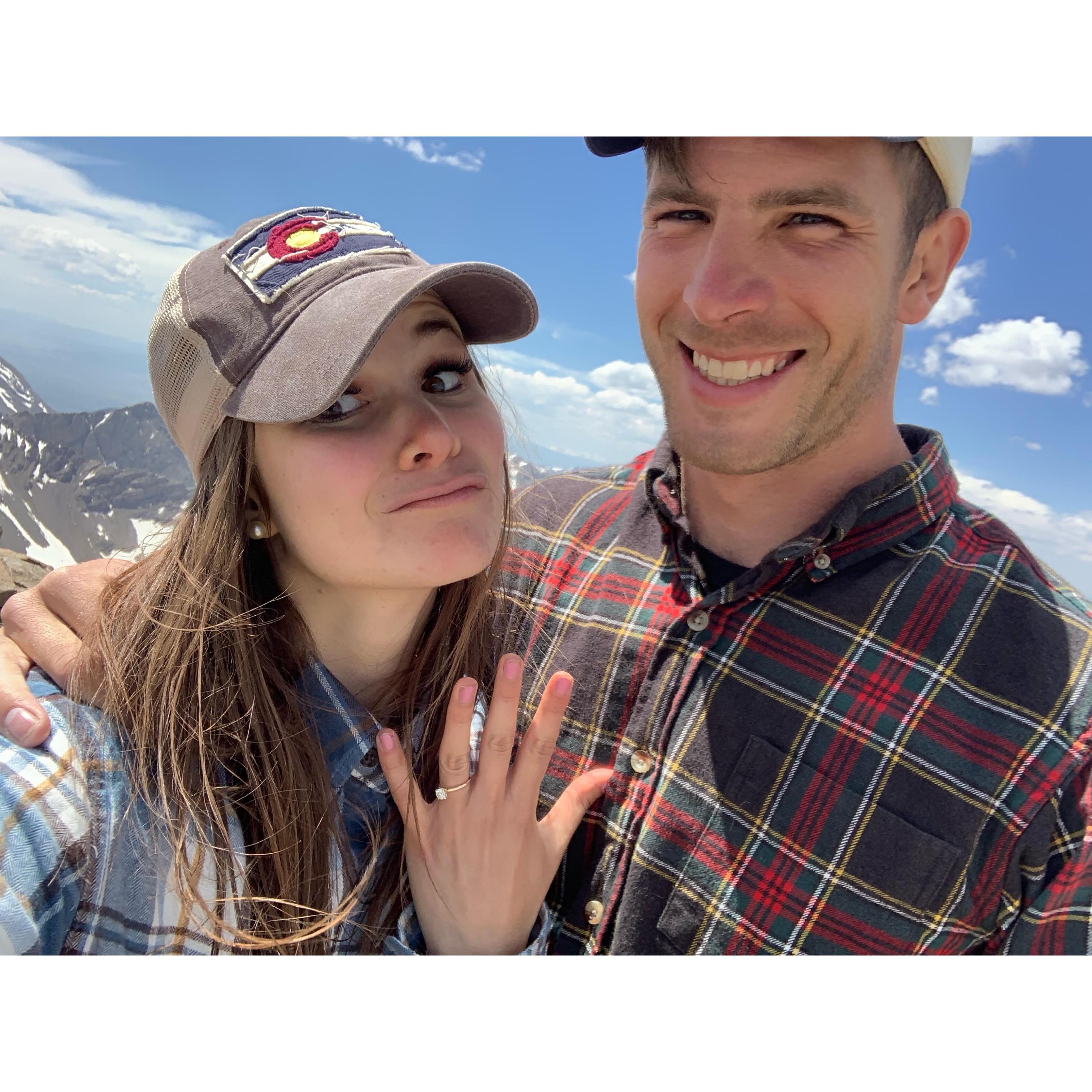 We're engaged! Proposal on the very top of a 14,000+ foot mountain