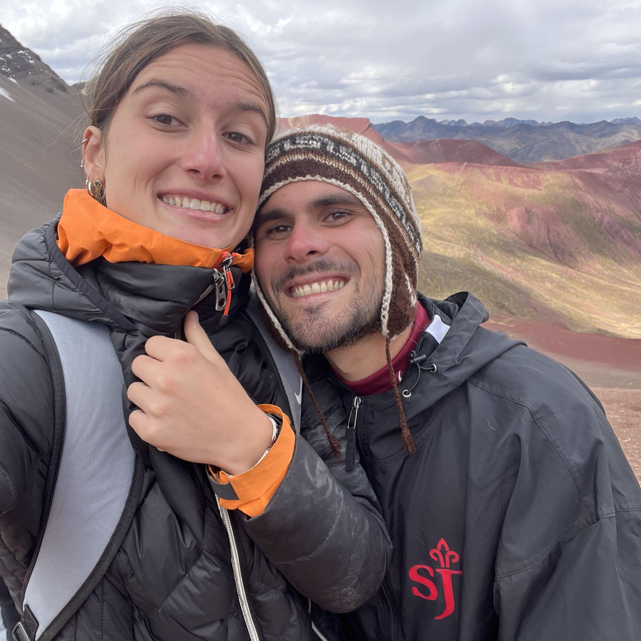 James and Charlotte hiking Rainbow Mountain in Peru