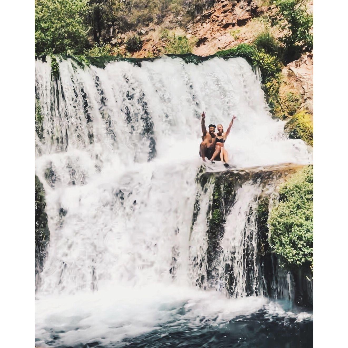 Sitting in the Fossil Creek waterfall in Arizona